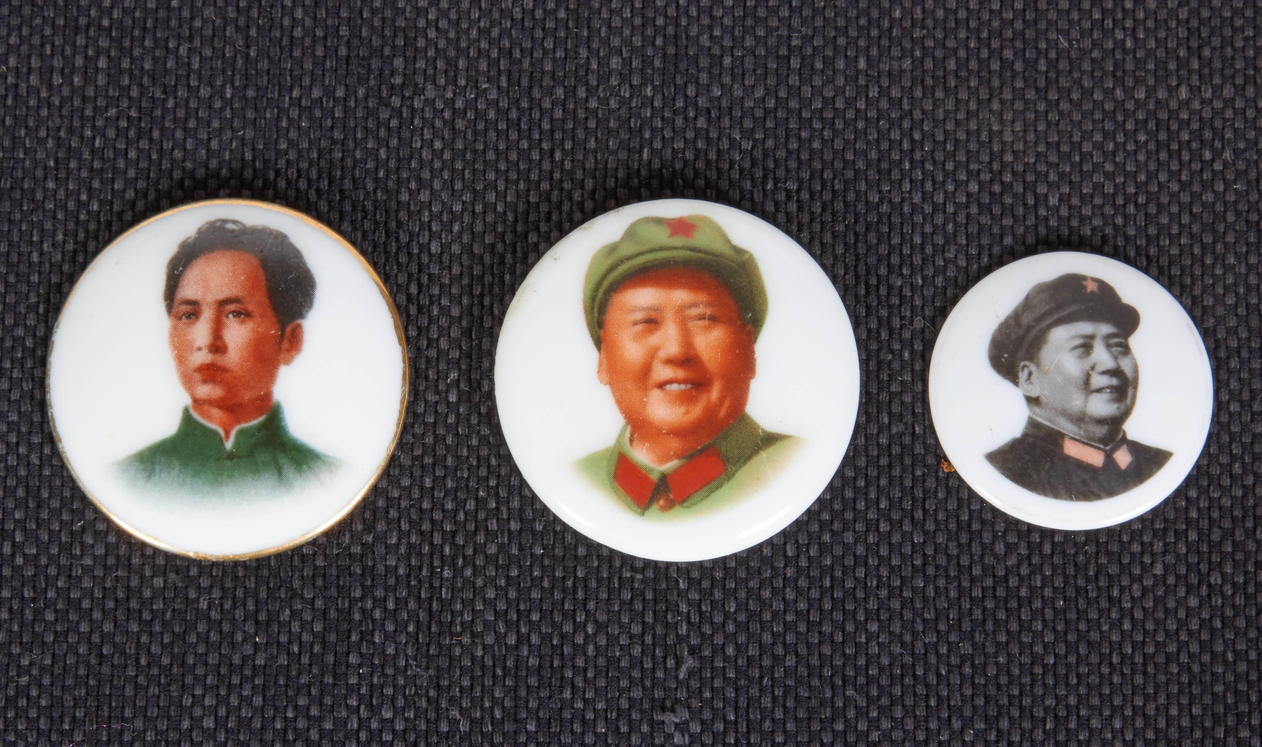 A collection of three 1960s Cultural Revolution period porcelain Mao pins. Each shows a different image of Chairman Mao.
China, circa 1960s.
KM1.