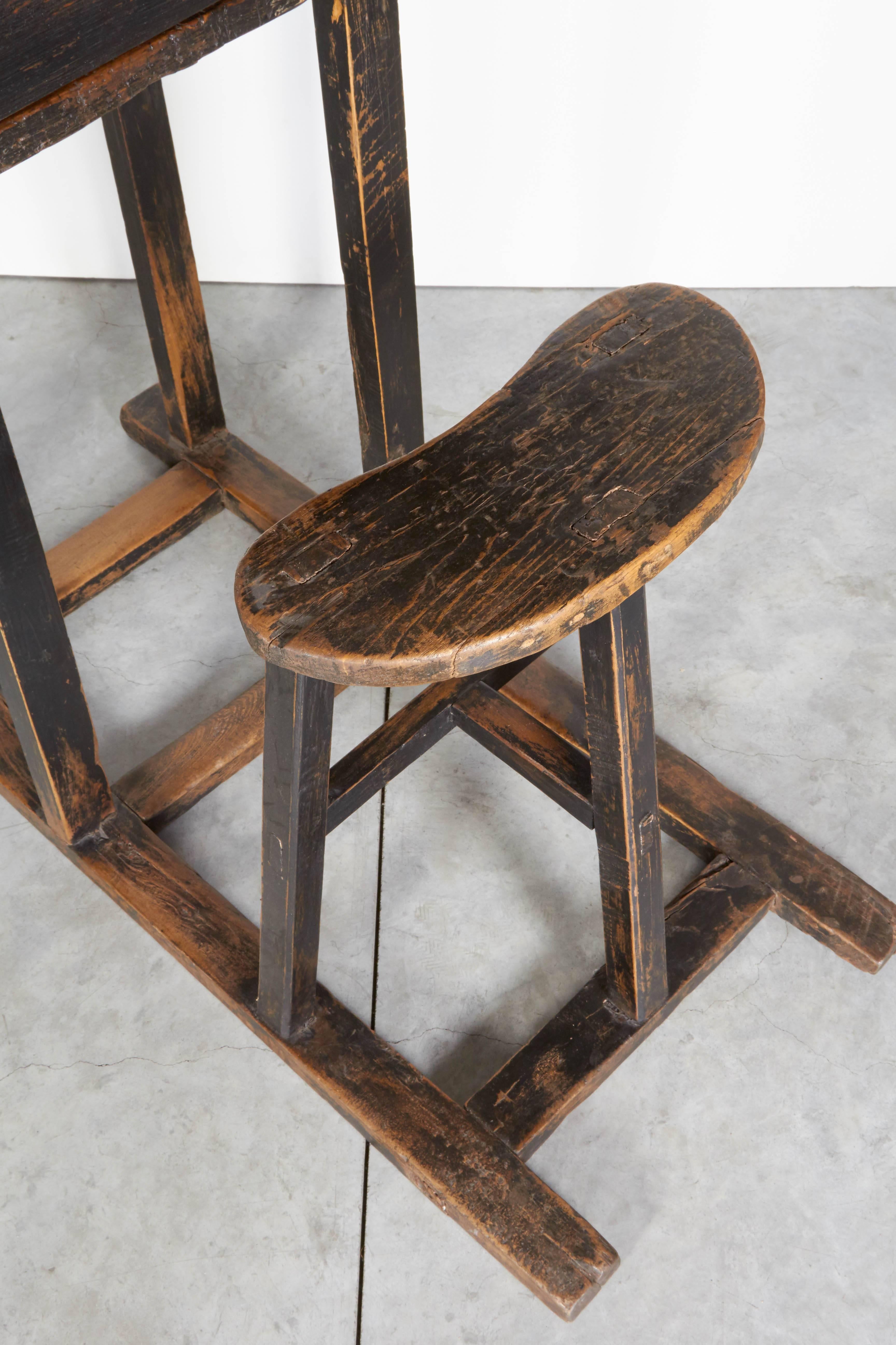 A nicely worn antique Chinese school desk with simple stool and single drawer desk all in one piece. Great patina with traces of original black paint. From Shanxi Province, circa 1900.
a b h a y a 
D305.