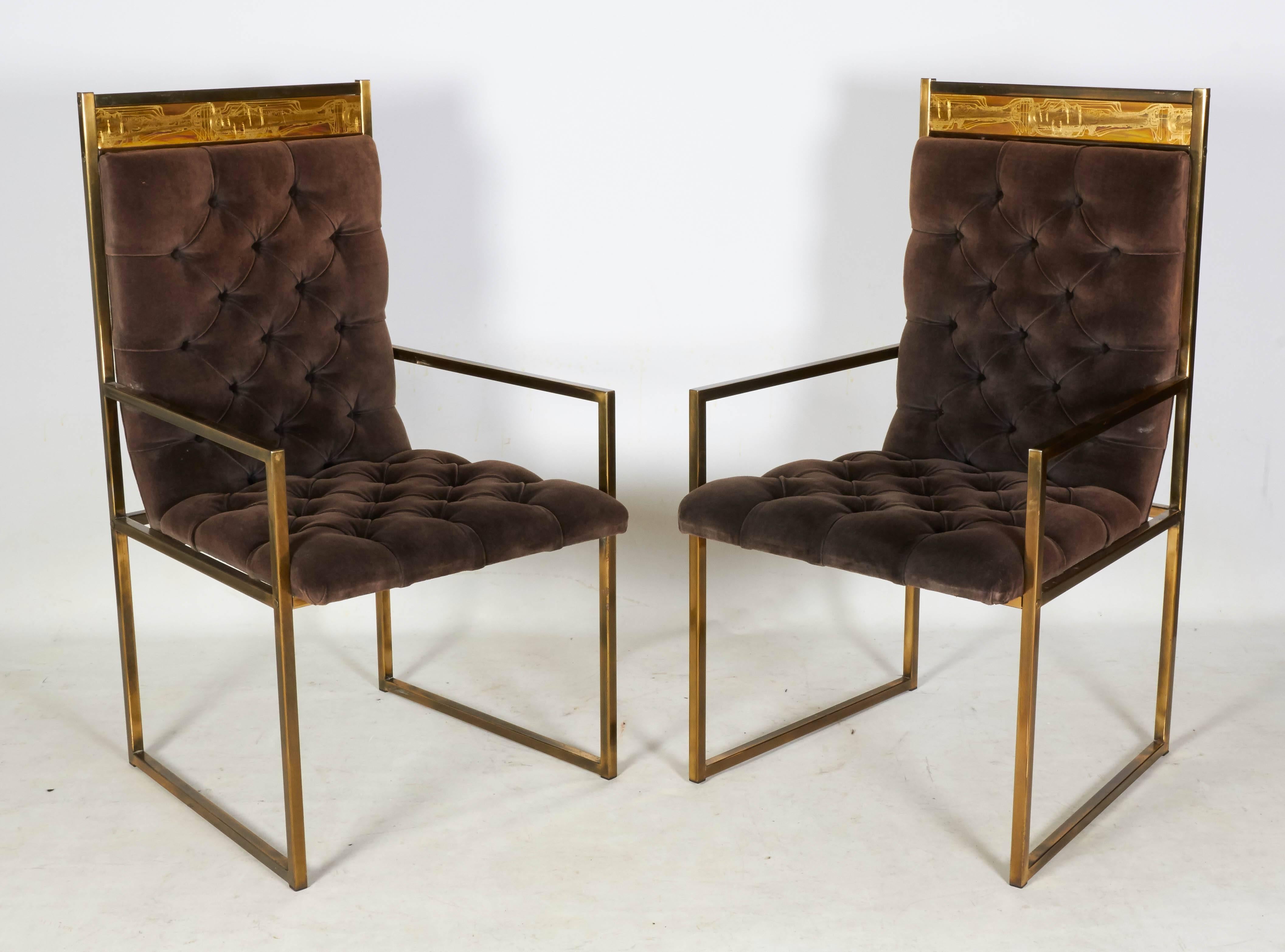 Extraordinary and very rare set of six decorative modern dining chairs by Bernhard Rohne for Mastercraft. The chairs are in brass with brown tufted velvet upholstery. Each chair is accented with a panel of Rohne's acid etched art. Matching brass
