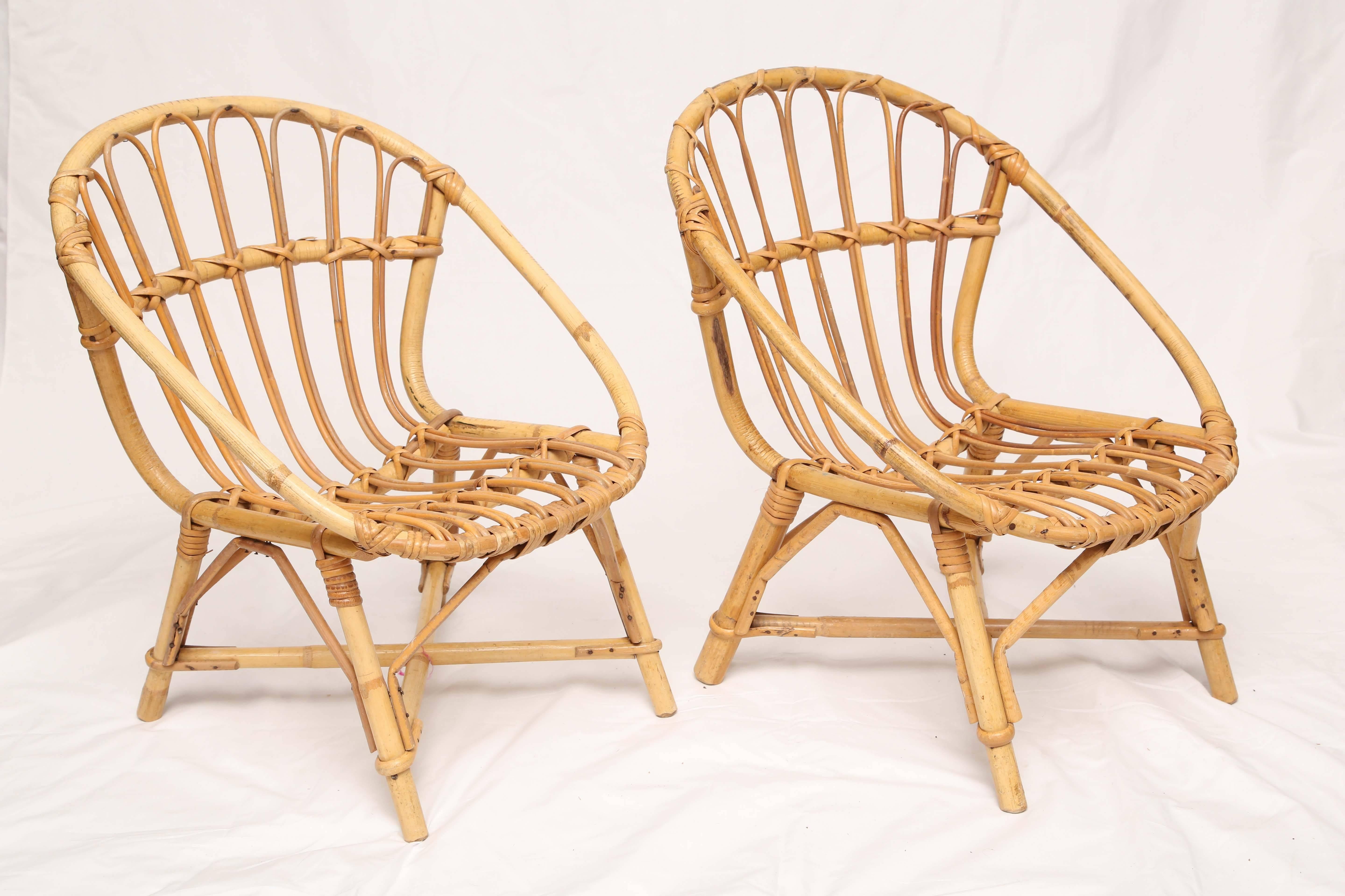 Pair of sweat vintage bamboo child chairs with plenty of details.