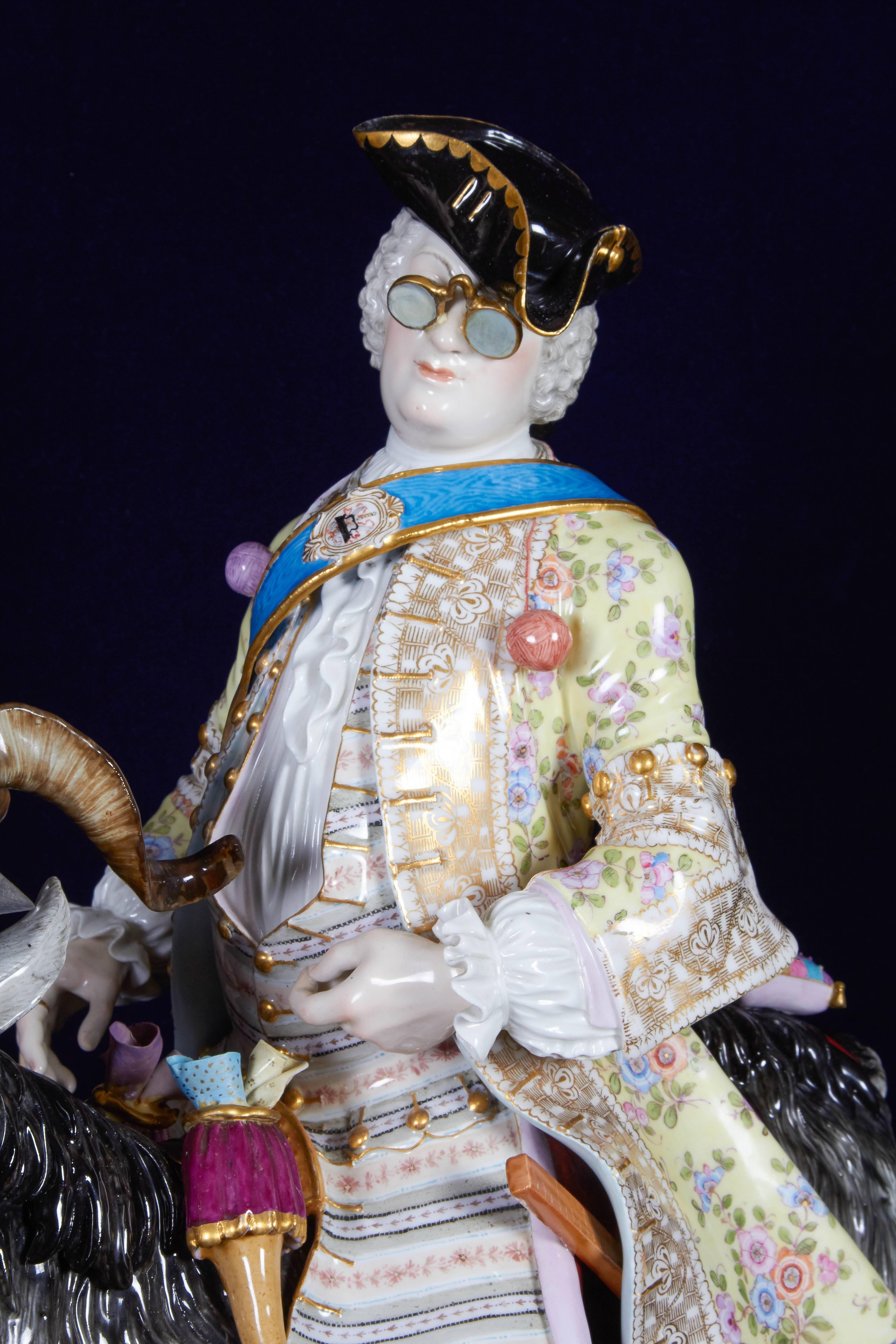 A large meissen model of count Bruhl's Tailor.
Mid-late 1800, blue crossed swords mark, incised 107, impressed 148.
Modeled seated astride a billy-goat, the bewigged and bespectacled gentleman wearing a floral coat, boots and a tricorn hat, the