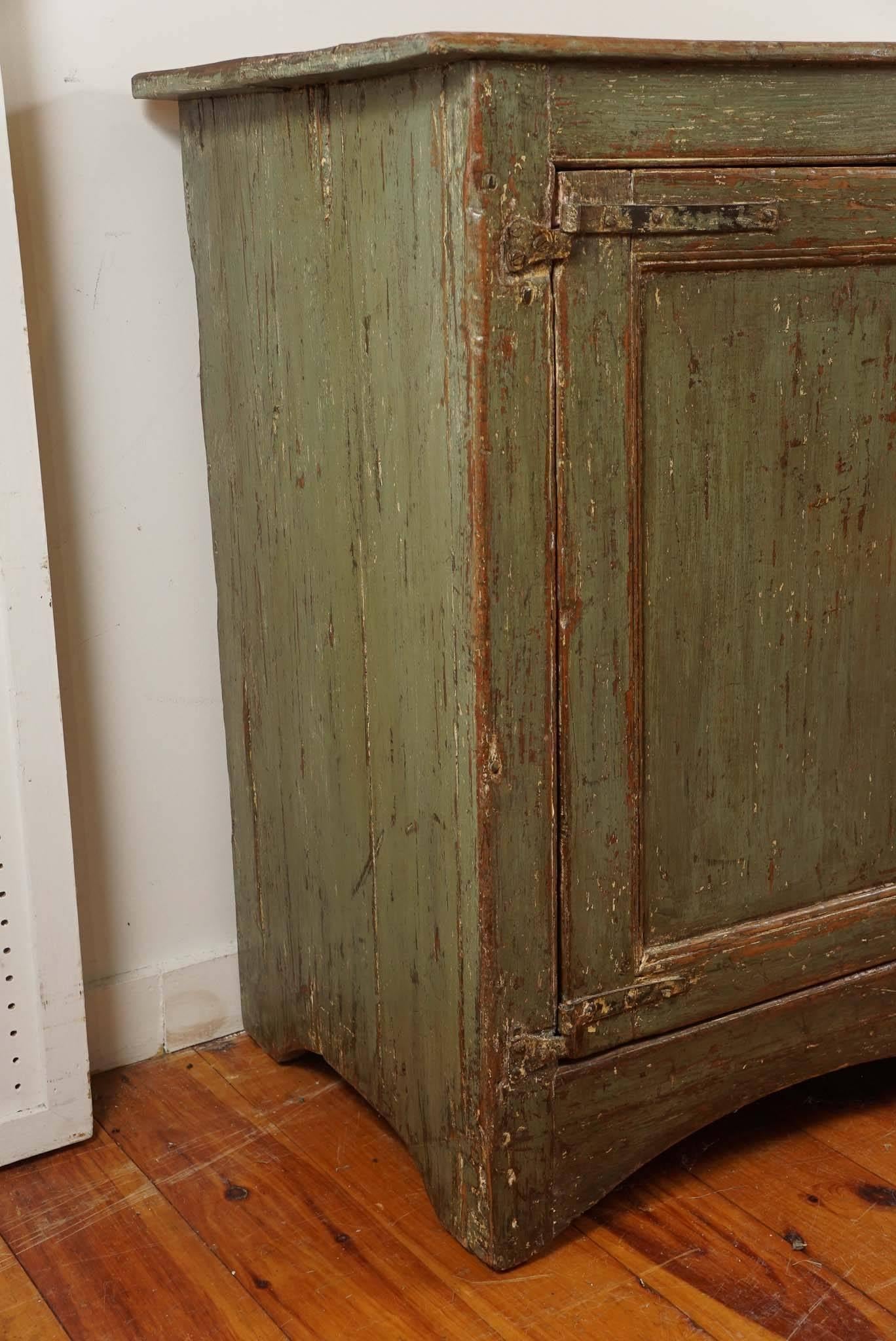 It’s a dead heat as to weather you will fall in love with the rich deep color green or the fantastic hinges and hardware first. Both are very apparent as soon as you look at this 1860 original painted buffet. Plenty of storage and shelf inside and a