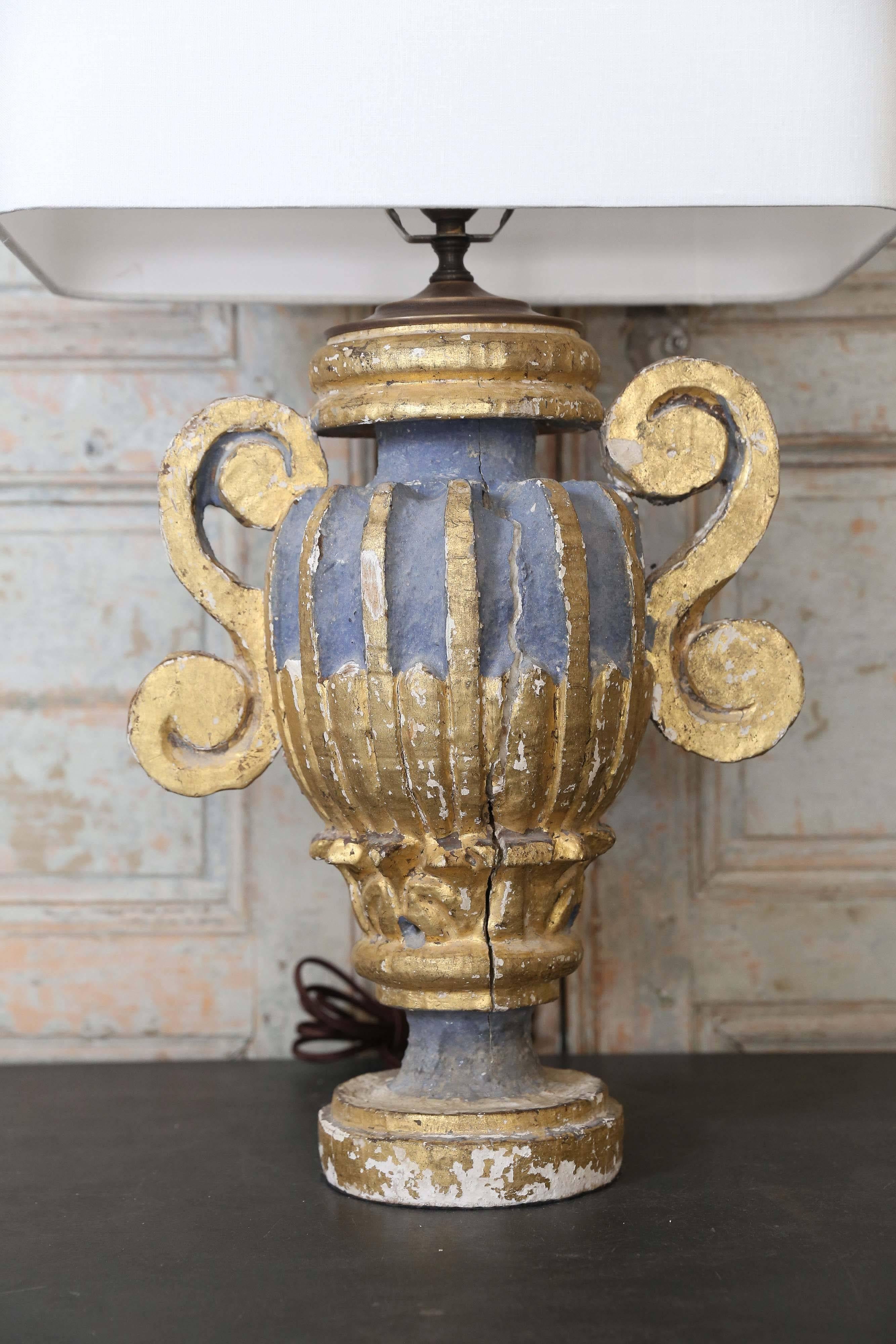 Custom polychrome Italian lamp fashioned from early 19th century urn-shape architectural fragment. Wonderful blue and gold color with a nice, rich patina. Newly-wired for use within the USA. Sold with a complementary linen shade (measurements