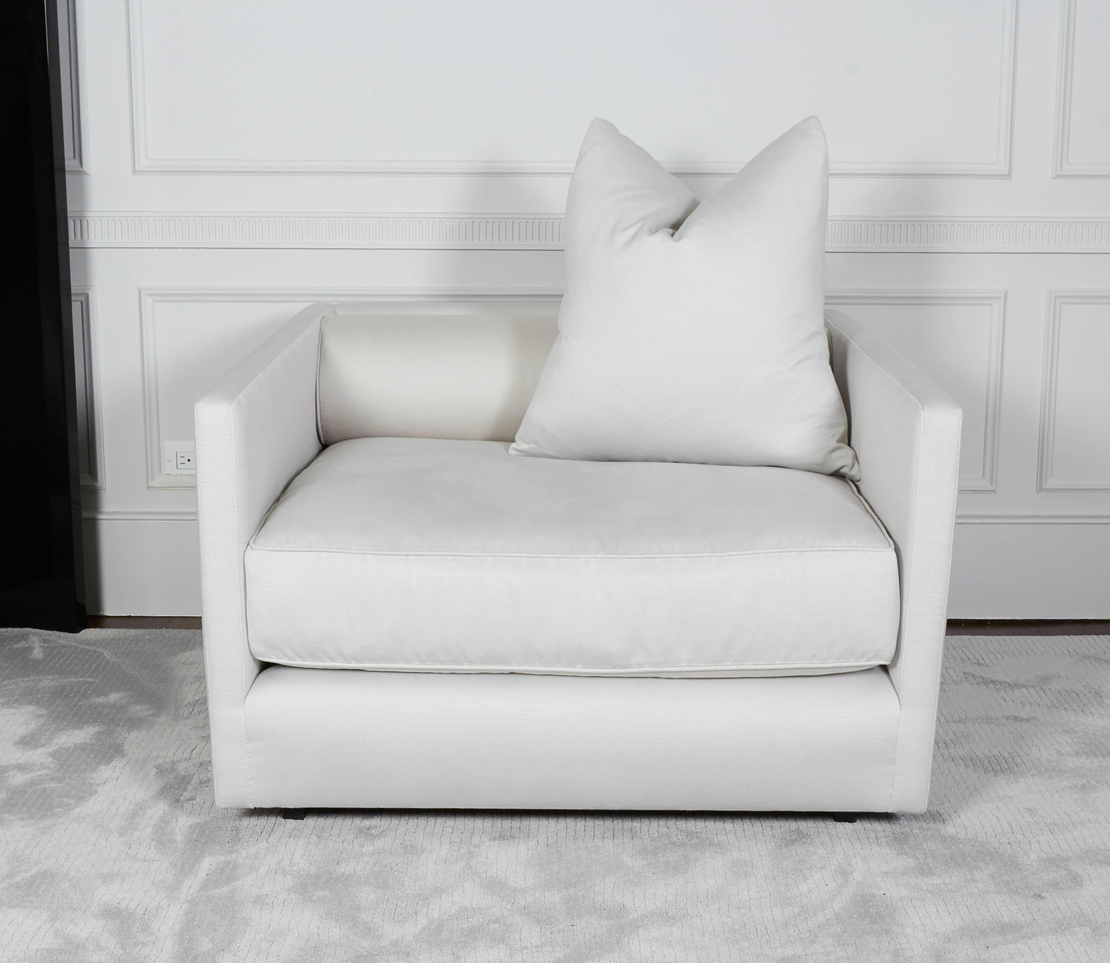 Custom Halston club chair by Ryan Korban is made to order and upholstered in a light grey ribbed French fabric.