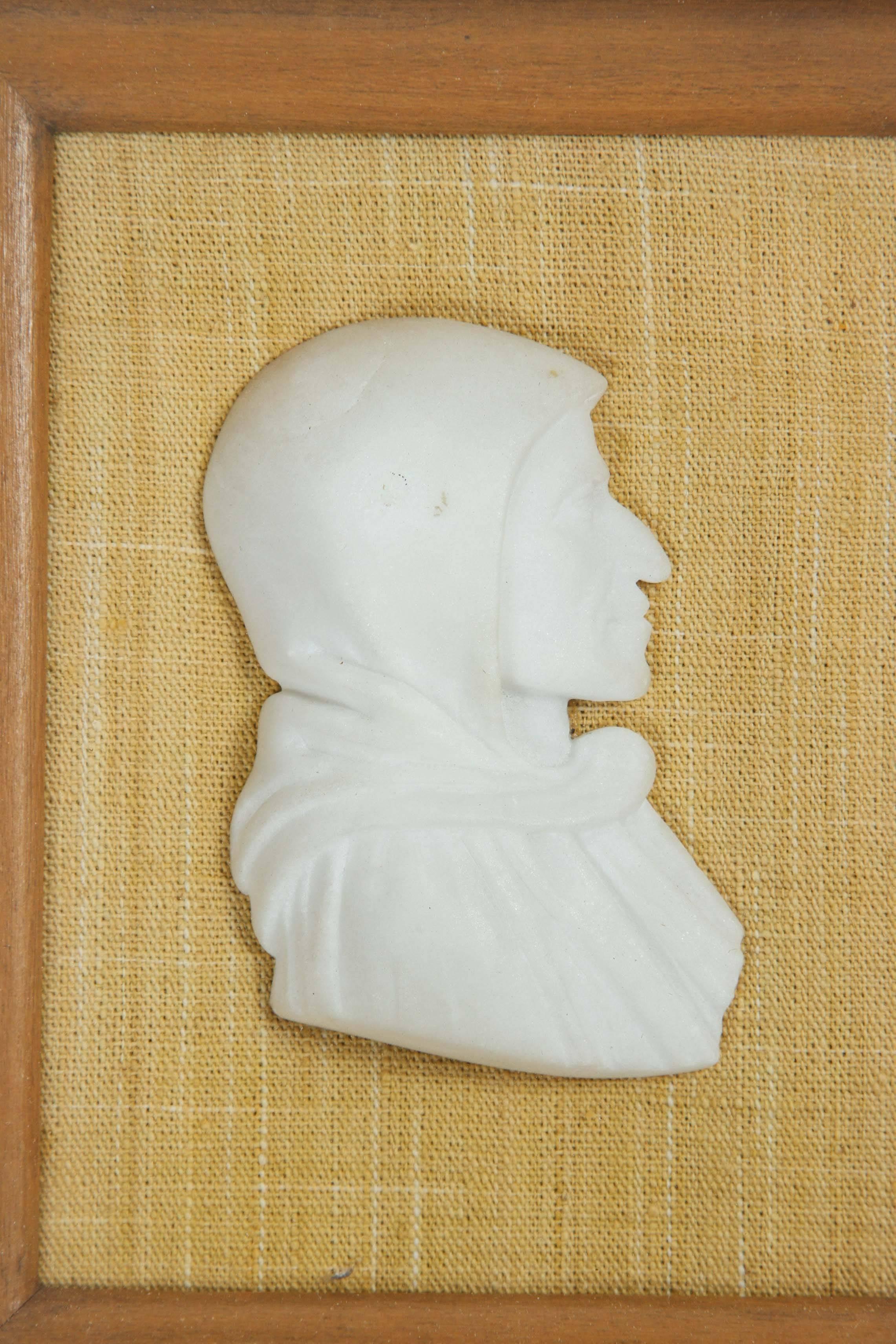 Pair of vintage carved alabaster profile portraits of Dante, framed and mounted on linen.