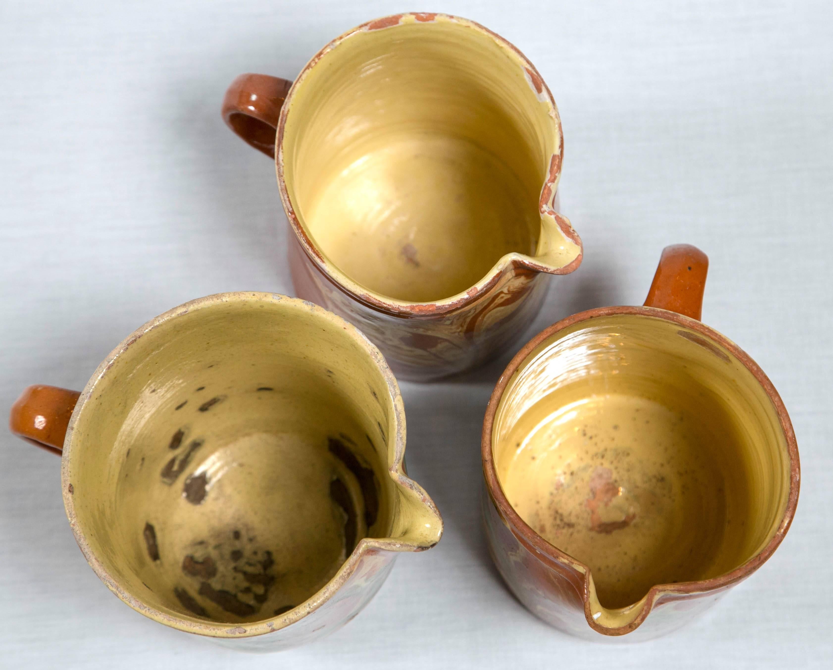 Collection of Three 'Jaspe' Pottery Pitchers, France, Late 19th Century 1
