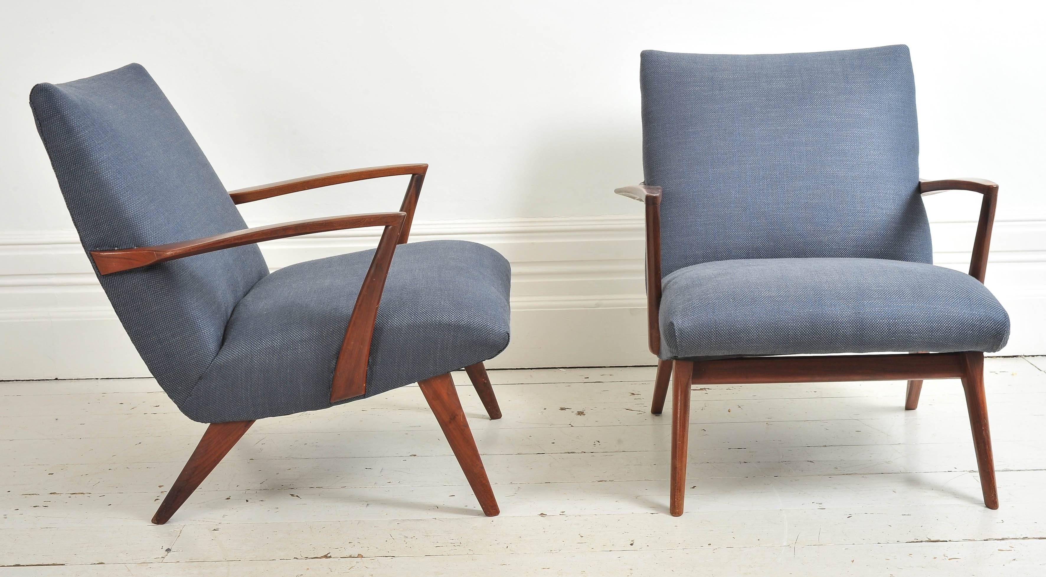 A pair of very stylish teak armchairs in the style of Poul Jensen.

We are happy to ship this item to you for an additional cost. Please contact us for a quote.