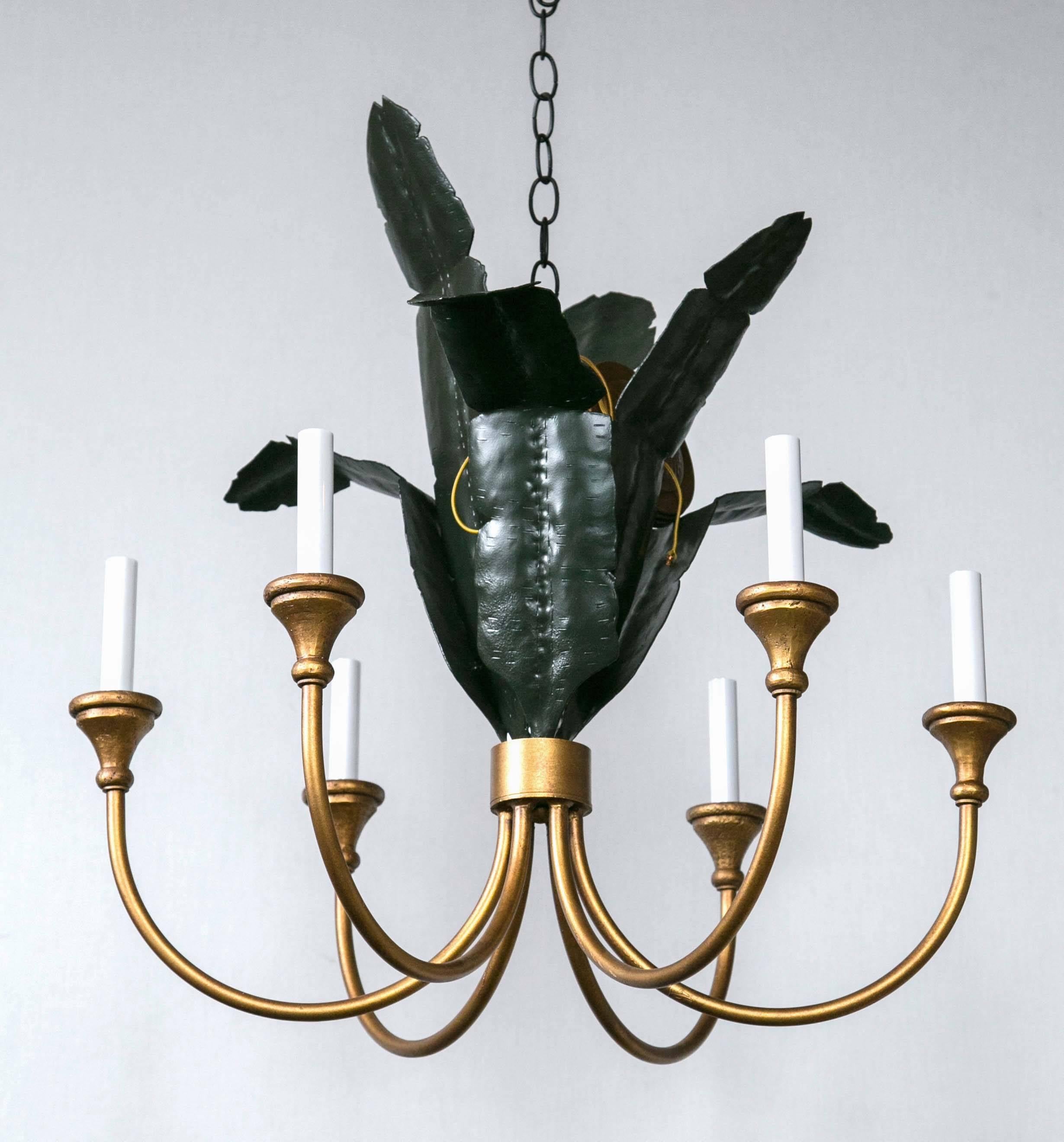 With original chain and canopy. Six-light candelabra bulbs. New old stock.
 