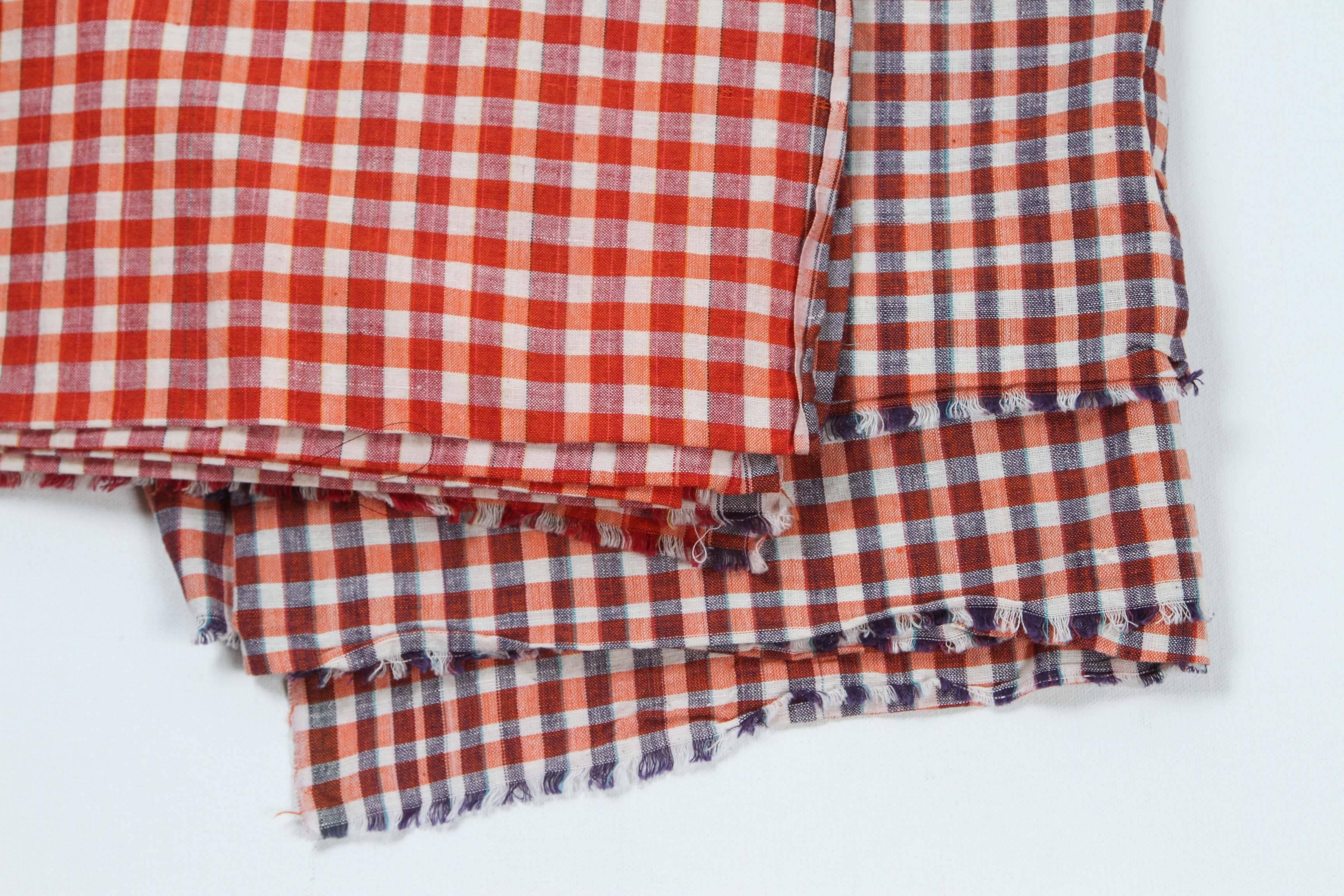 Khadi cotton fabric inspired by Gandhi and the Indian independence movement. Still made today and sold in Khadi shops all-over India.

The summer throws (Lungis) are used as wraparound sarongs in India.  Ethnic. 