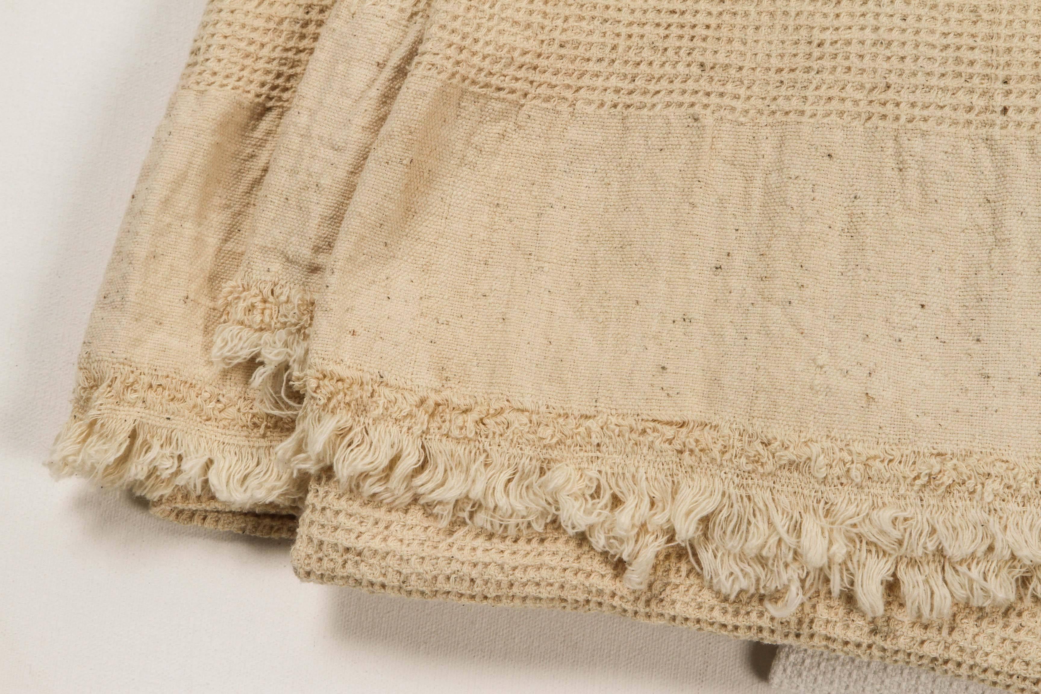 Hand spun and handwoven Khadi fabric cottons. Inspired by Gandhi and the Indian independence movement. Still made today and sold in Khadi shops all over India.

Waffle towels are light weight, totally absorbent and useful as beach, spa or regular