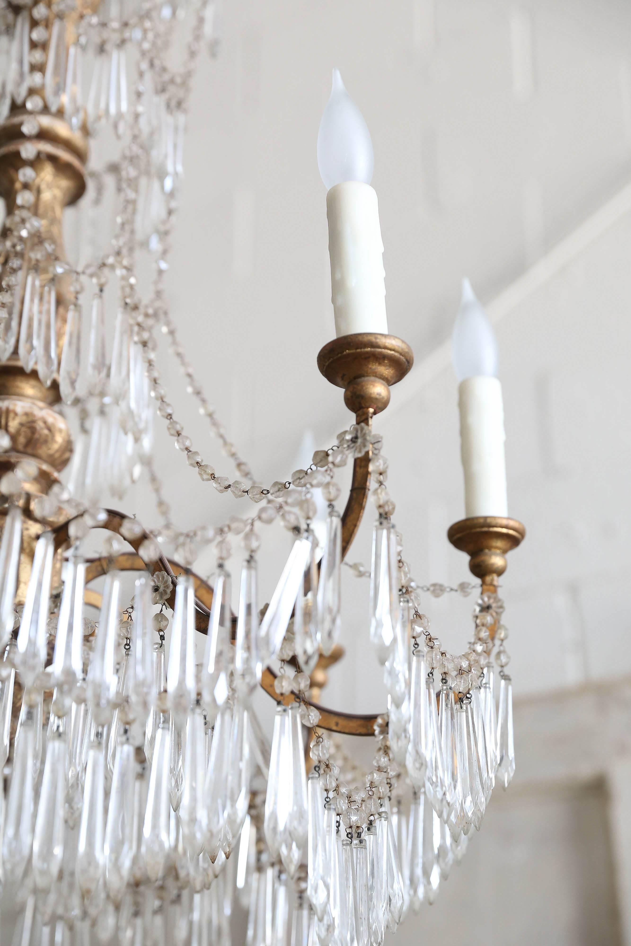 19th Century Italian Gold Gilt Wooden Multi-Tier Draped Crystal Chandelier In Good Condition In Houston, TX