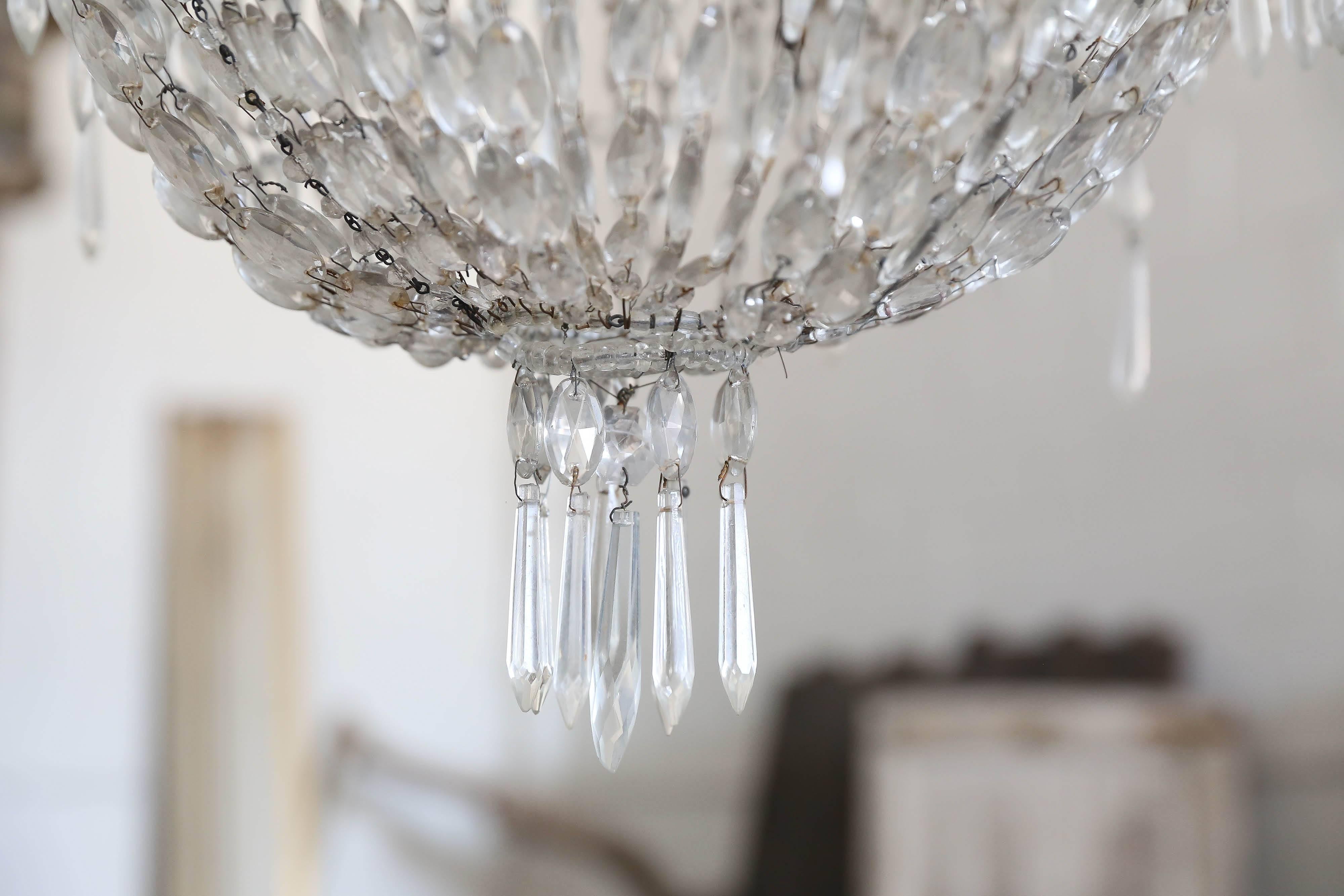 Elegant crystal chandelier from Italy called "Sack of Pearls". Newly wired. It would have held candles.