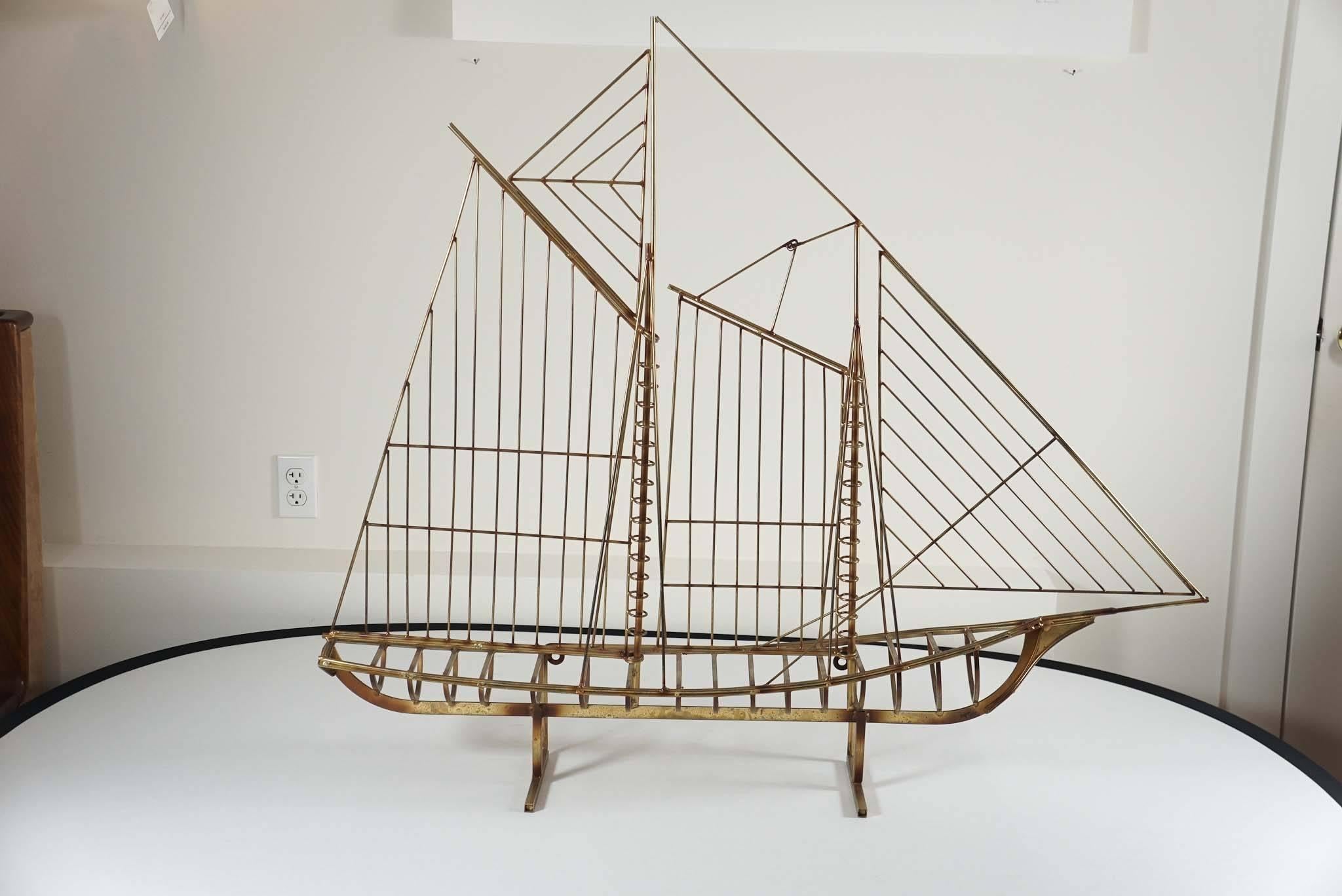 Classic, Mid-Century, brass metal boat sculpture, designed by 
Jerry Fels and Curtis Freiler. Their Mission, to produce, 