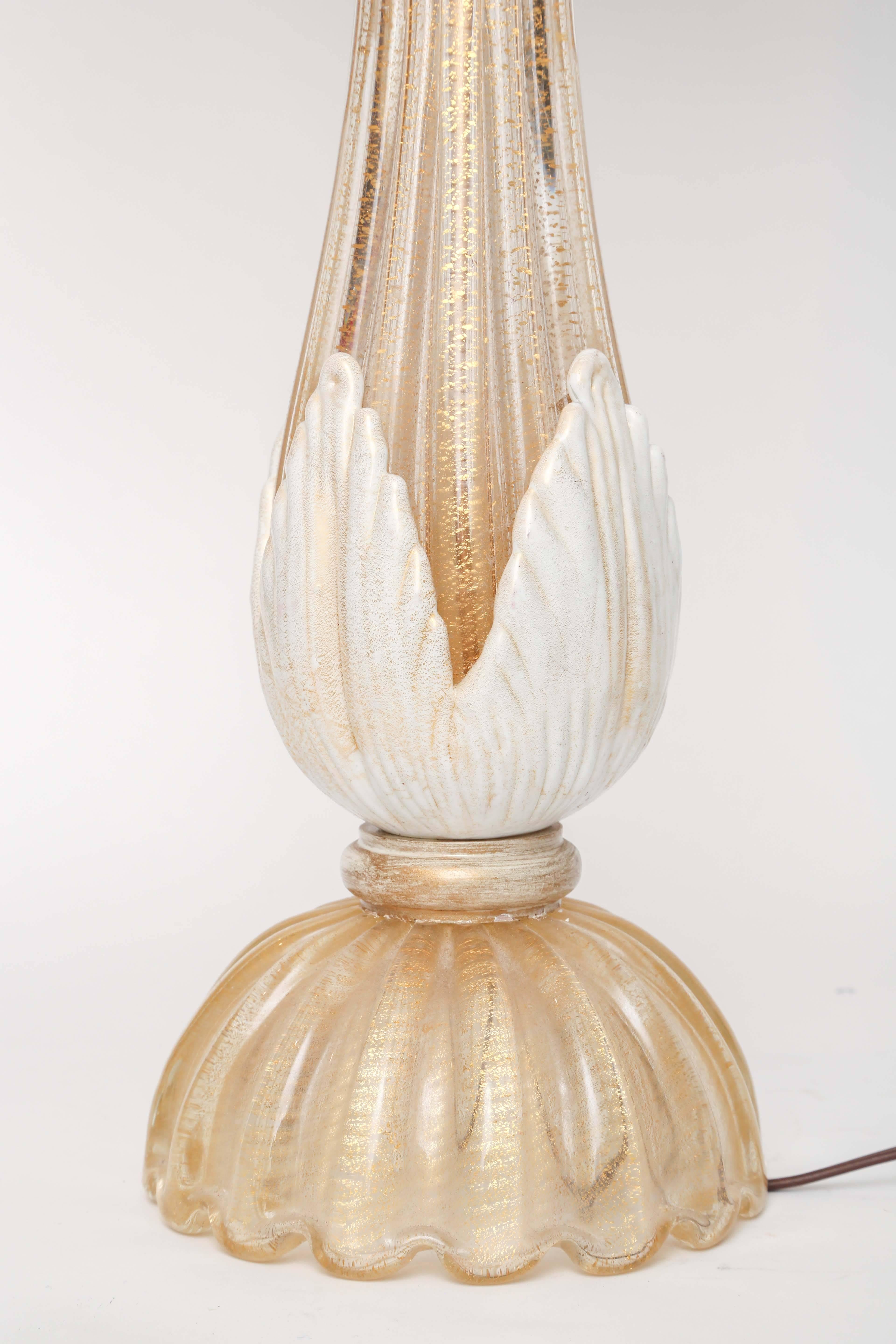 Blown glass in clear, gold and white by Barovier / Toso in Murano, Italy. Neck, light socket, adjustable harp and finial are in brass. Electrical is original and in working order. Uses a regular bulb. Shade not included. Glass is in excellent shape.