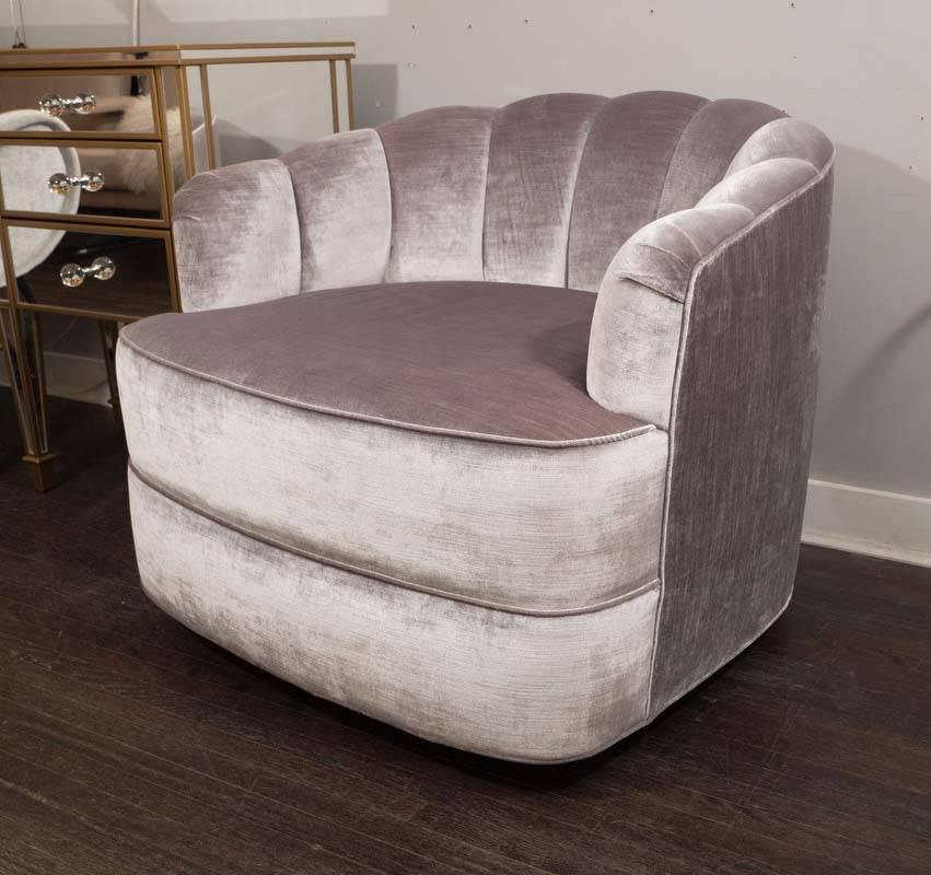 1970s Milo Baughman channel back swivel tub chair upholstered in silver velvet.