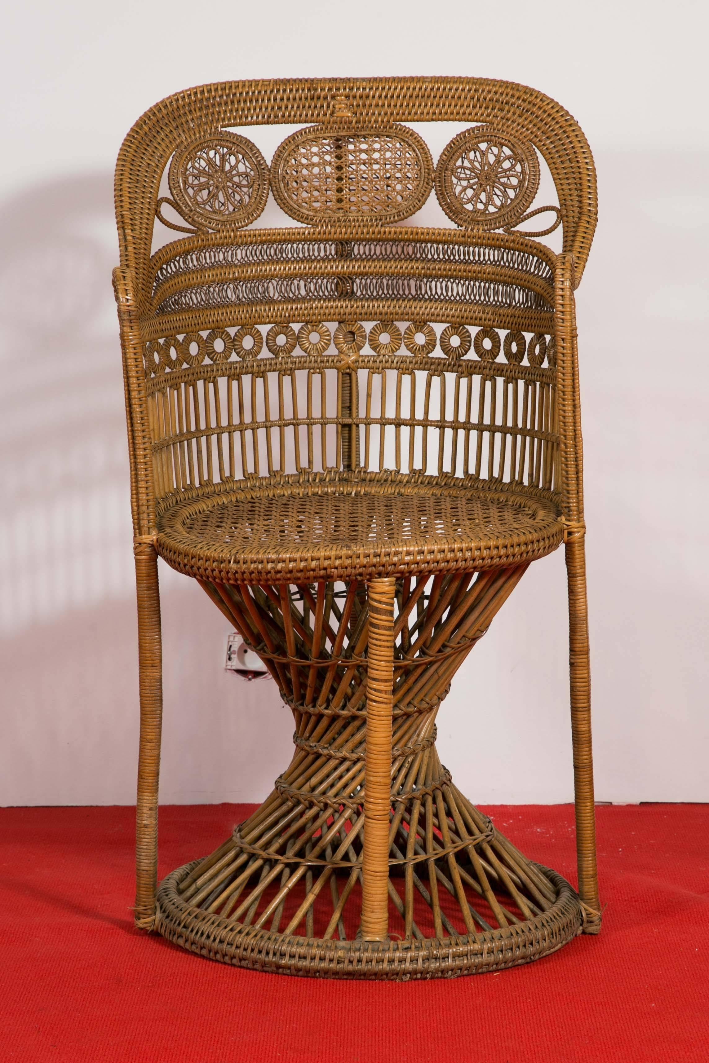 This pair of armchairs is an outstanding example of the quality of work achieved by the Parisian House Perret & Vibert. The base is composed of a rattan beam and rattan sticks twisted, which have the form of an hourglass, supported by four posts in