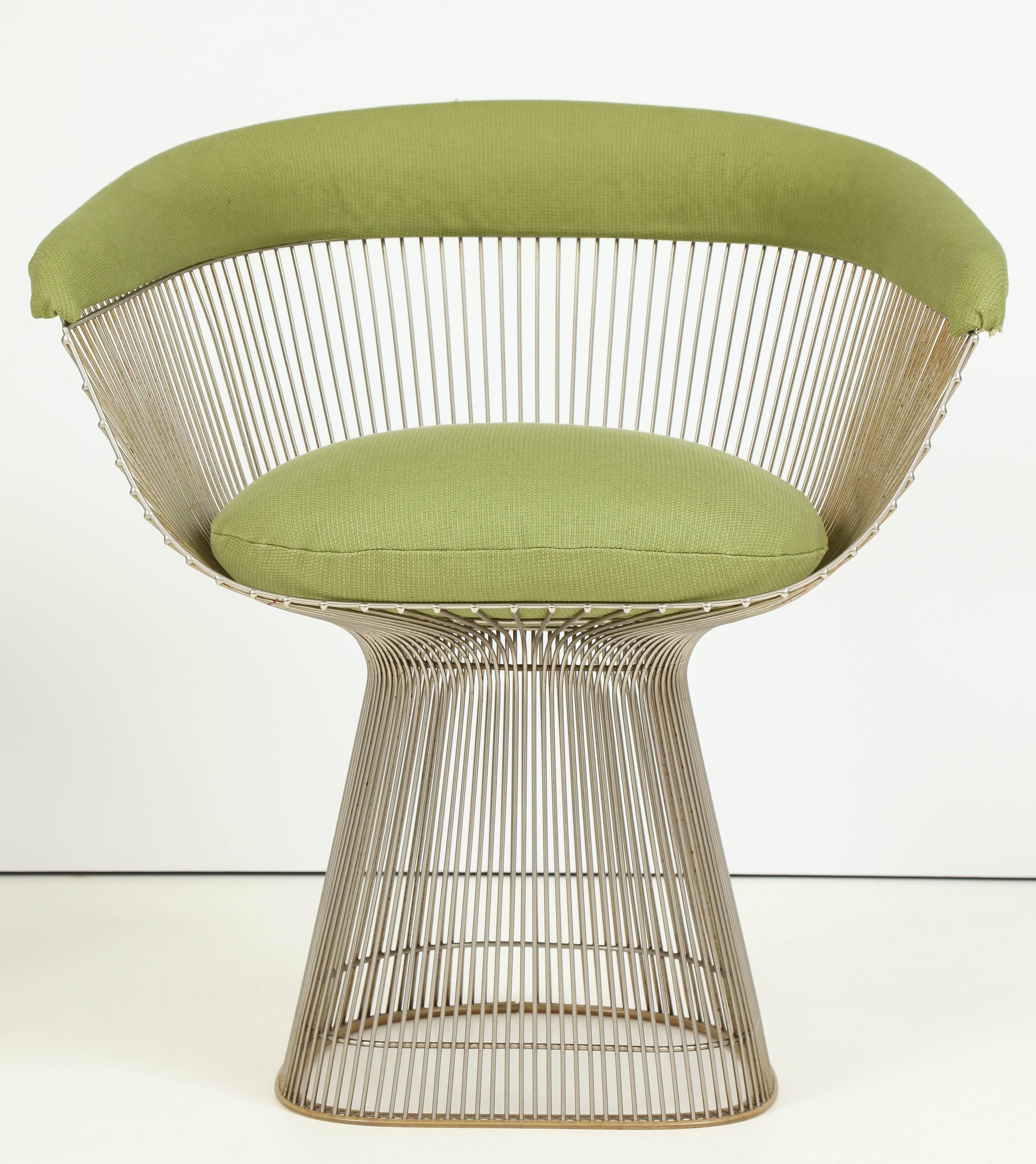 Exceptional set of two dining chairs by Warren Platner made of vertical steel rods
upholstered with green cotton.