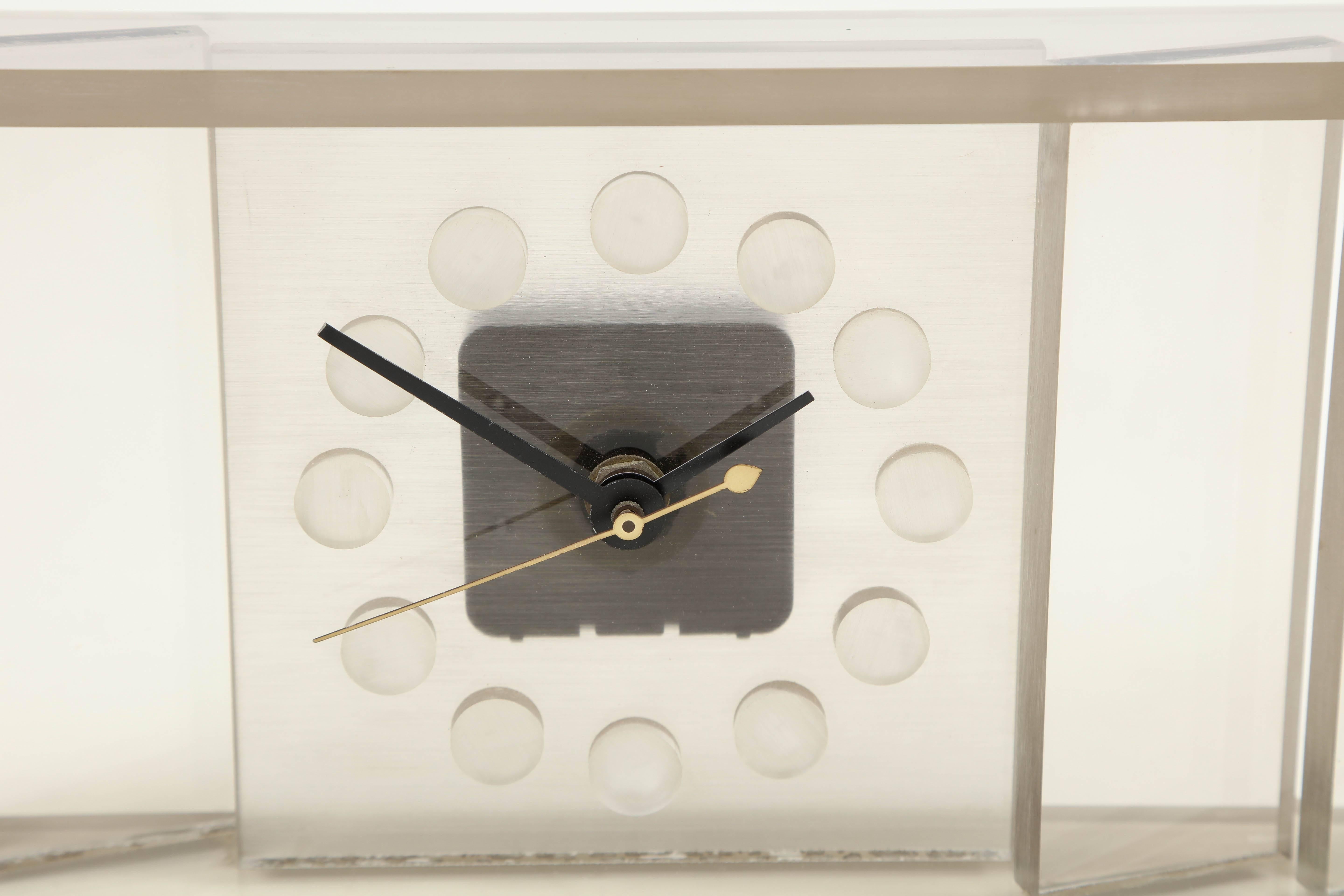 Decorative, Mid-Century Modern Lucite desk clock, Italy, circa 1960.