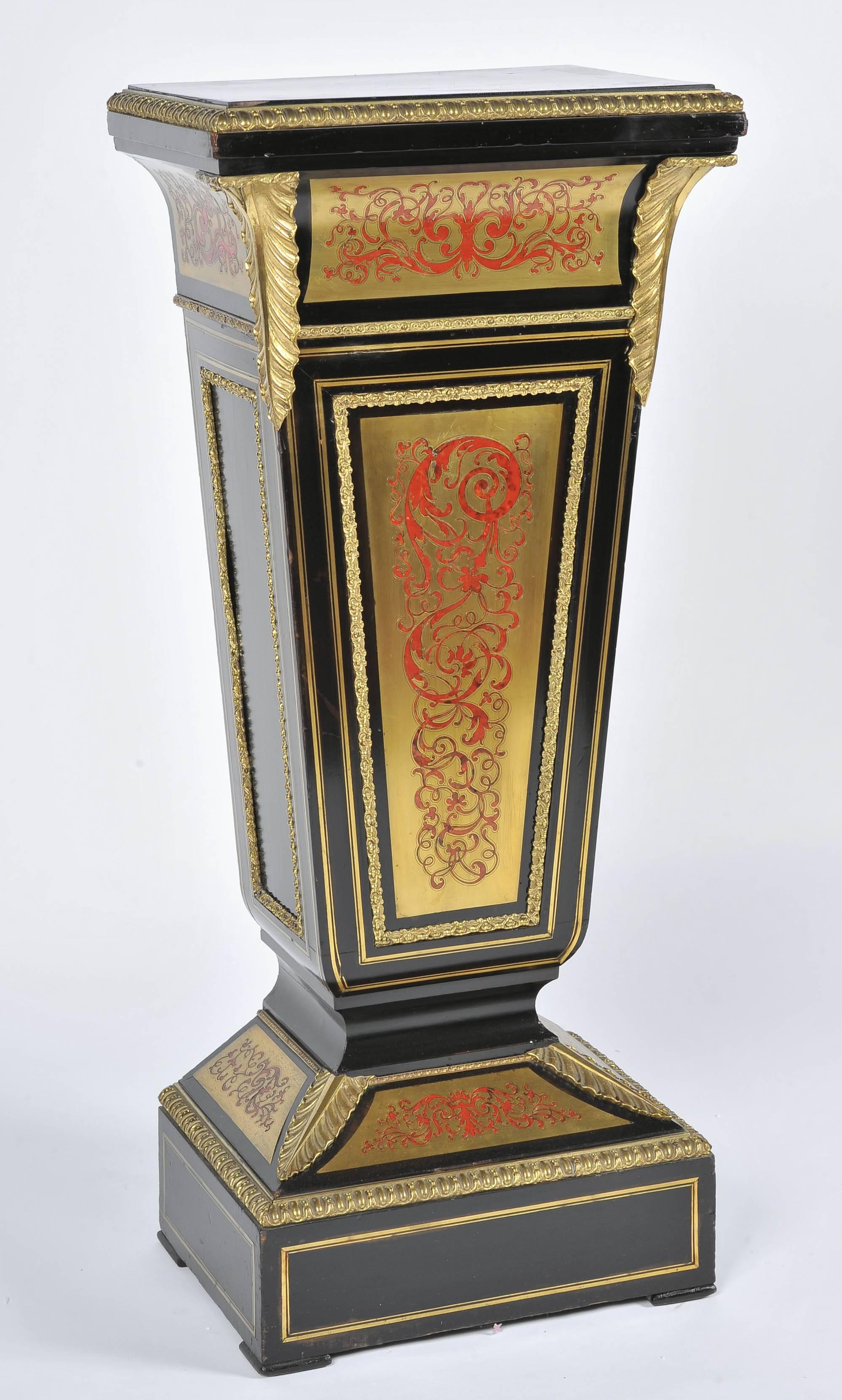A good quality pair of 19th century French Ebonized, Boulle inlaid, ormolu-mounted pedestals.