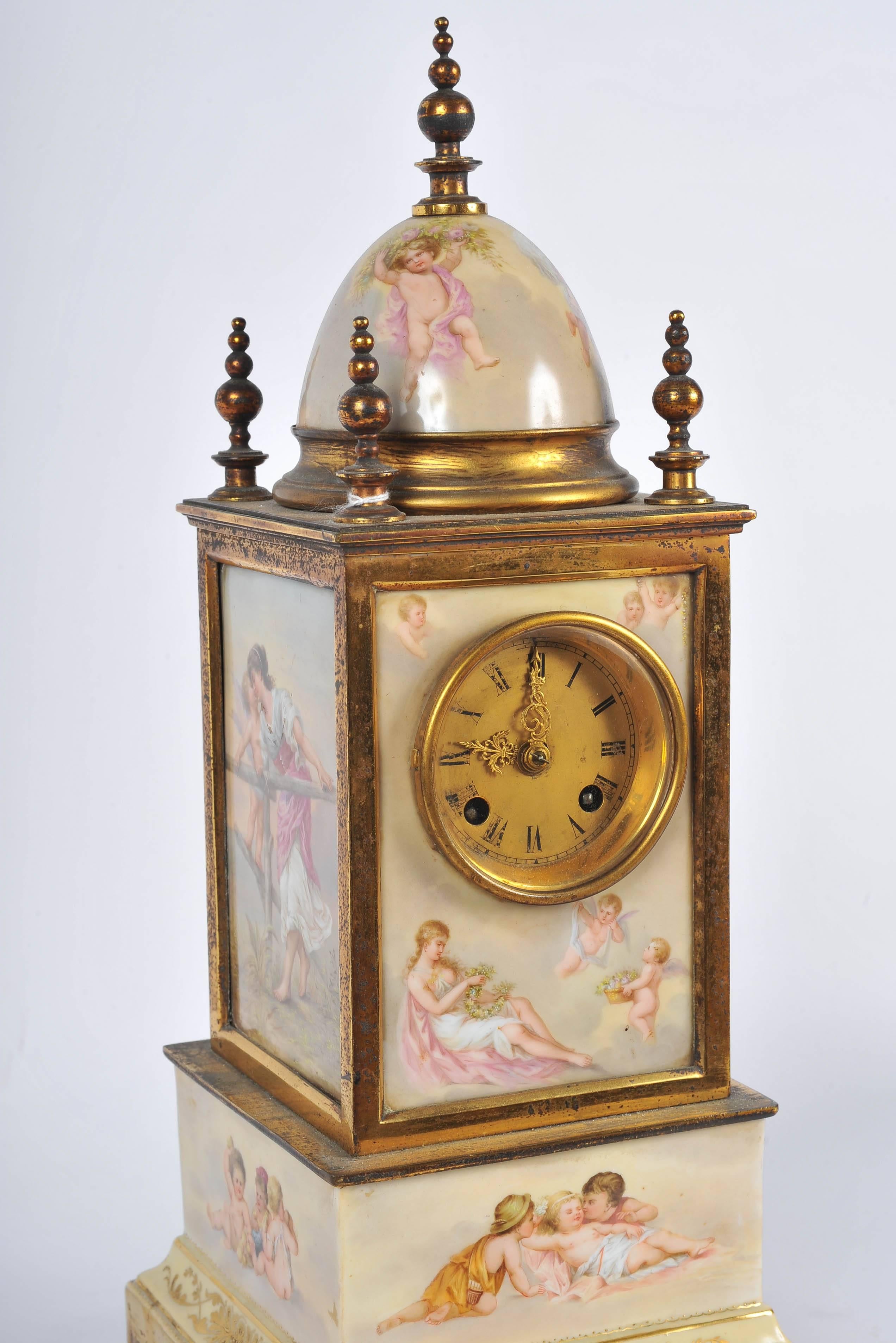 A good quality 19th century Vienna porcelain mantel clock. Each of the porcelain panels depicting classical scenes, set in gilded ormolu. The clock being an eight-day movement and chimes on the hour.