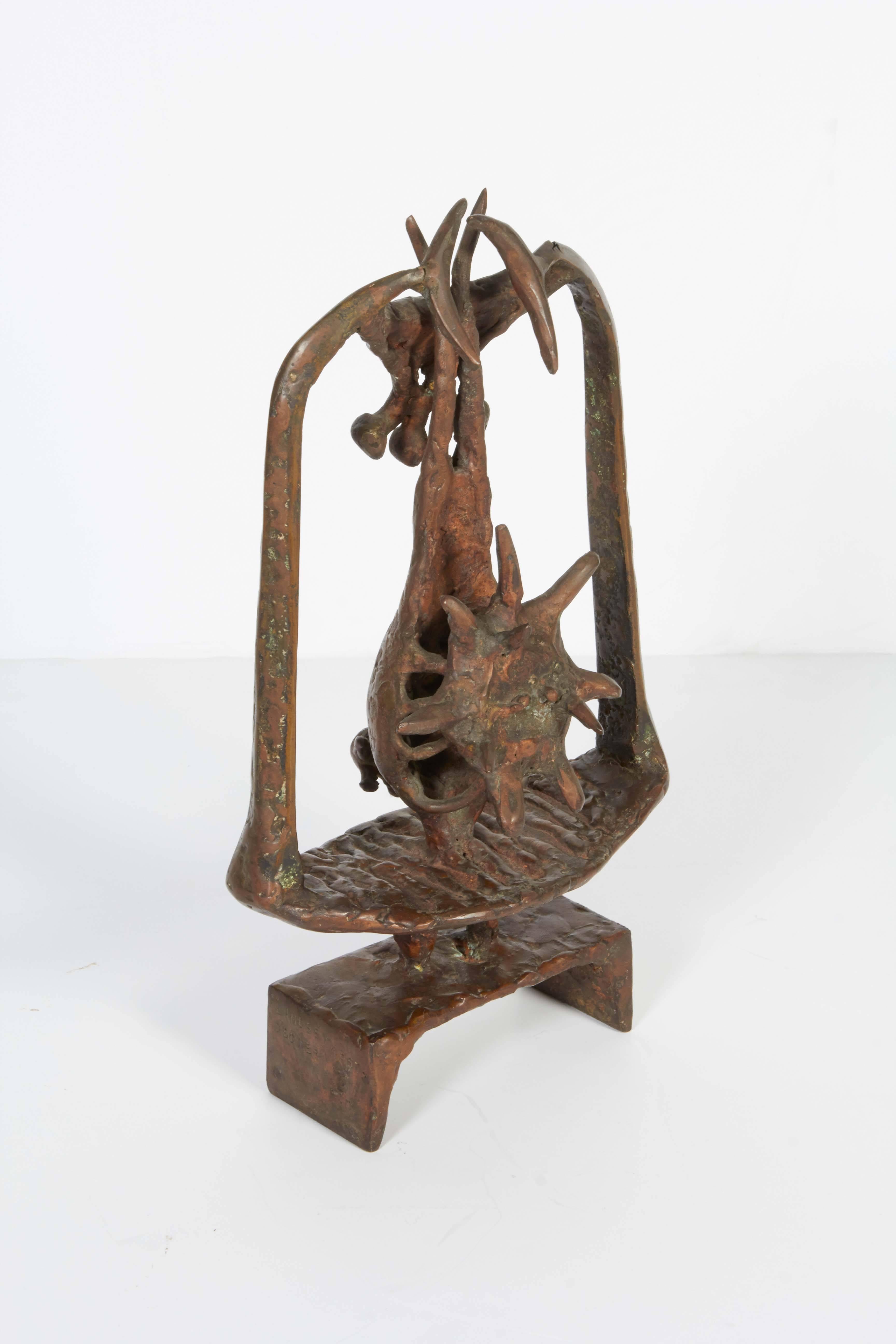 An abstract sculpture by Lindsey Decker, the Brutalist inspired piece comprised of bronze. Markings include the artist's signature and date [Lindsey Decker/ 1957] stamped to the bottom. The sculpture remains in very good vintage condition,