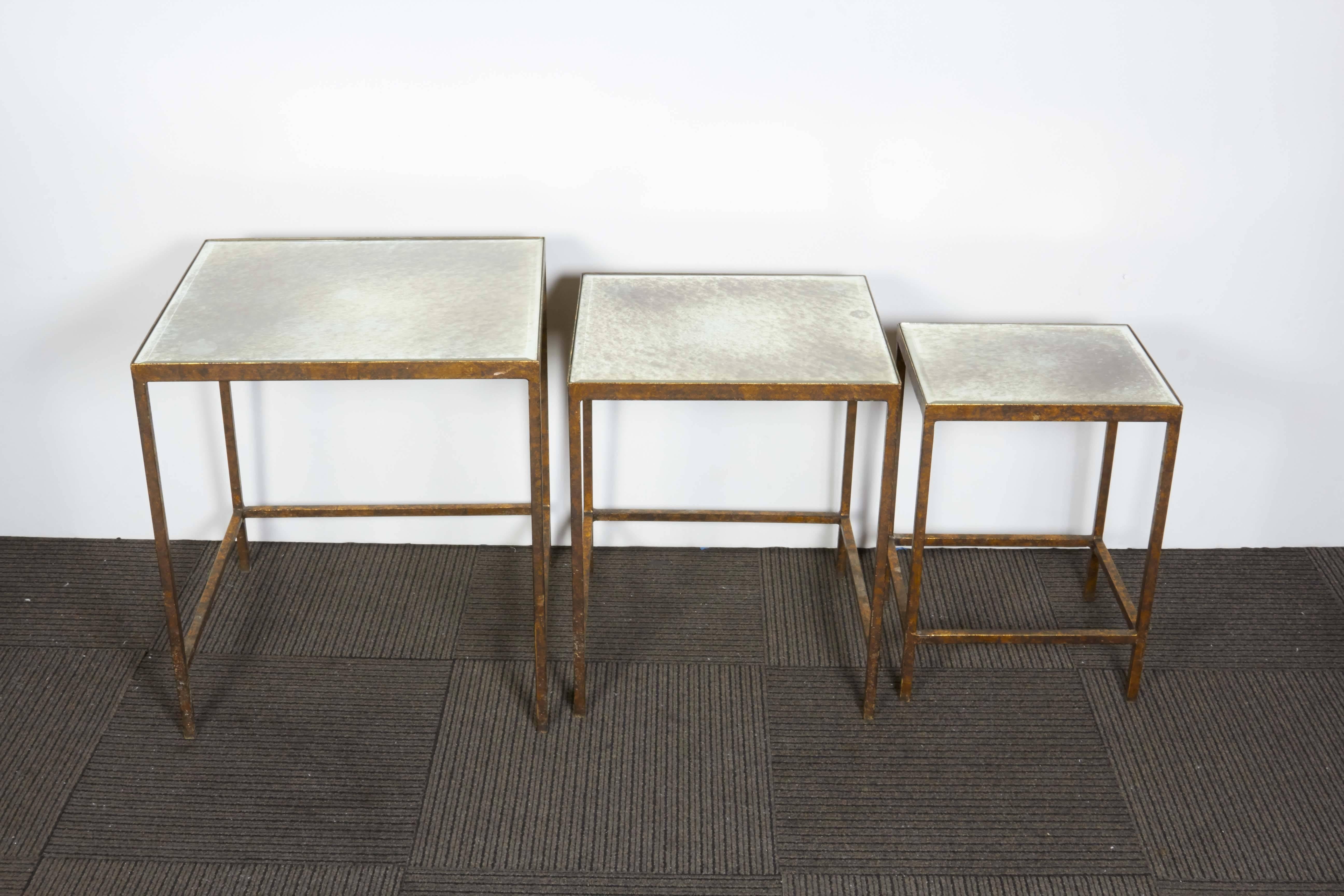Set of Three Gilt Metal Nesting Tables with Mirrored Tops 1
