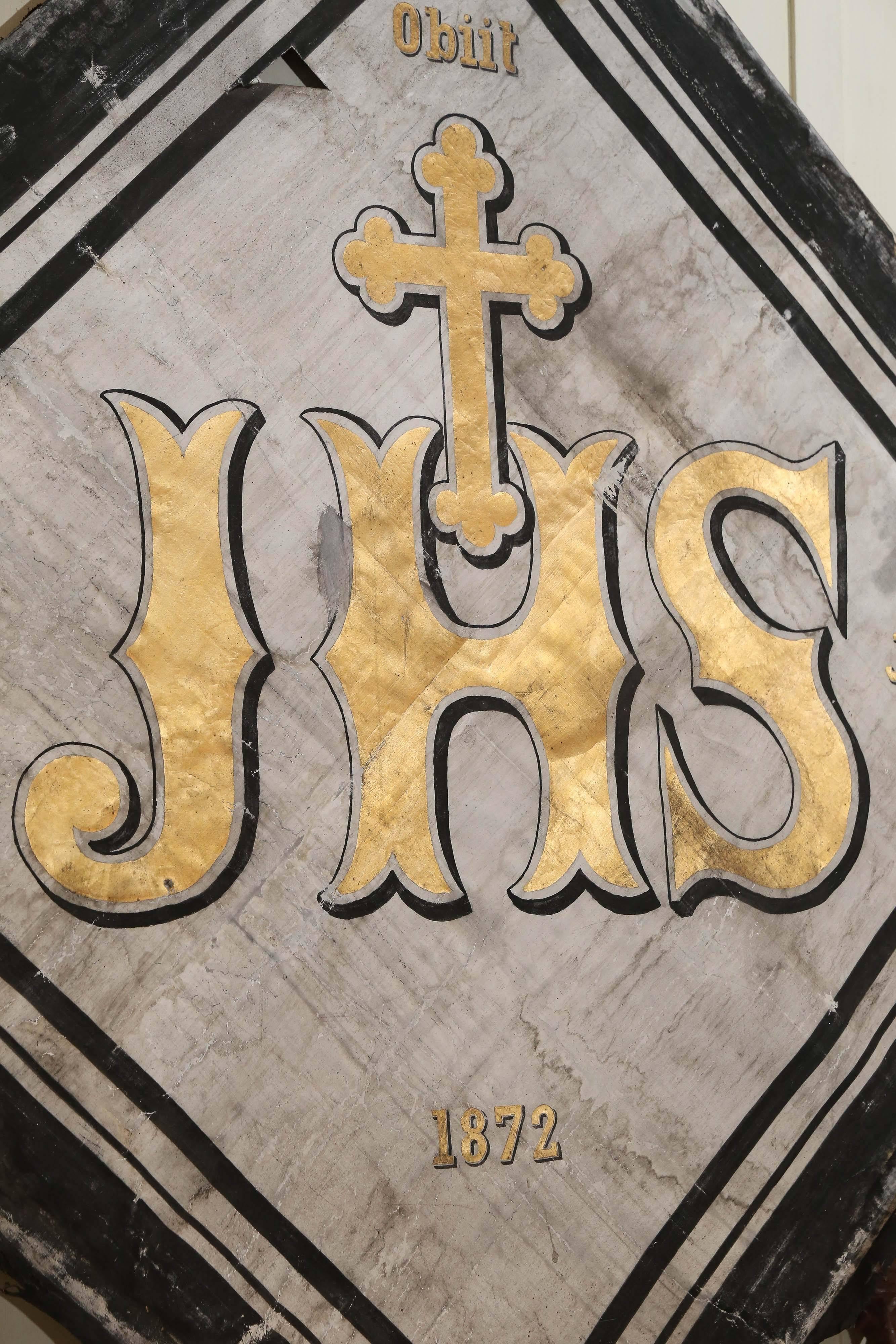 Dated July of 1872 and discovered in Northern France, this very special piece hung in a church and was considered a symbol of the patron families who made donations to the church. The letters JHS are the abbreviation for the latin 