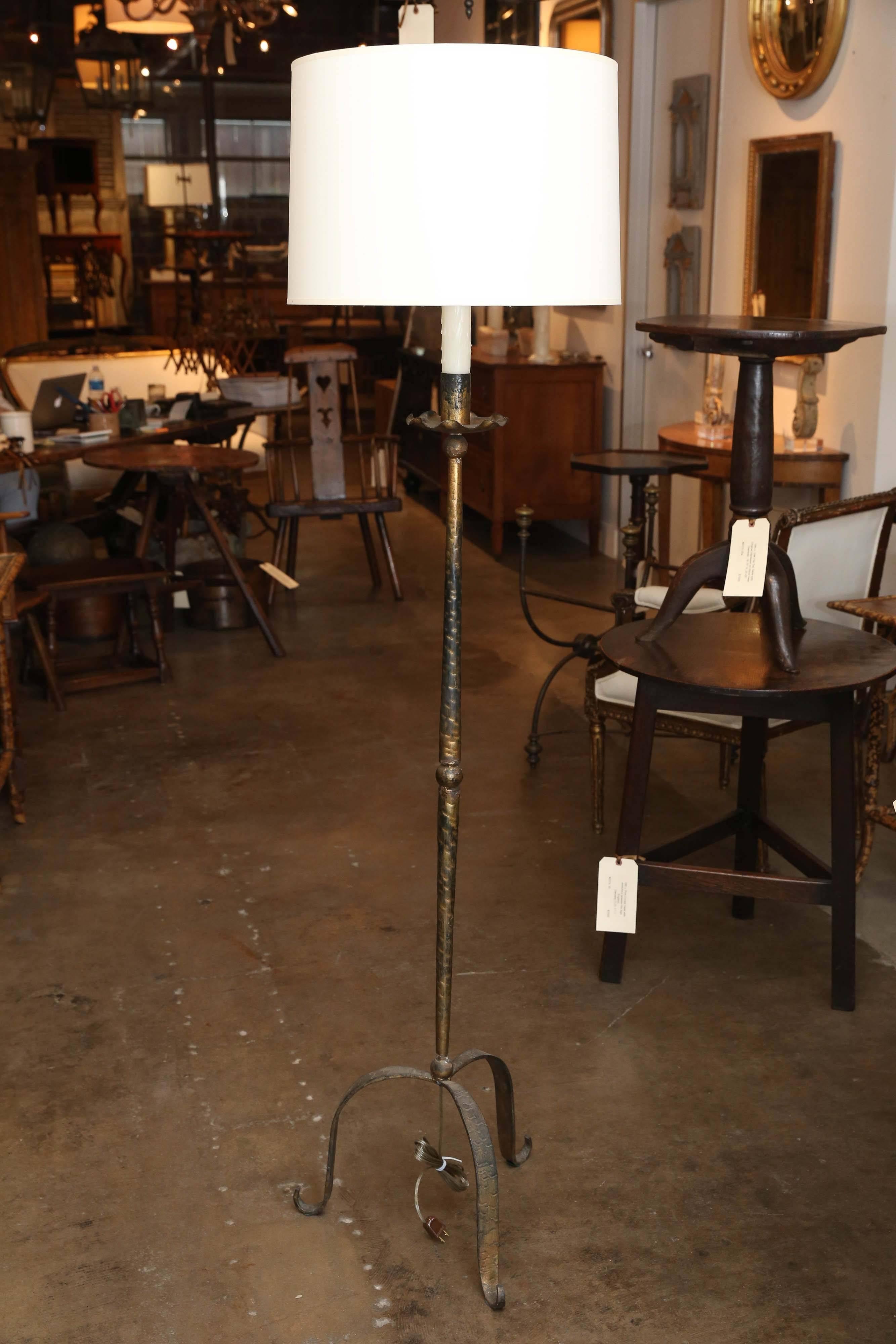 Antique gilt floor lamp recently rewired for use in the U.S.  The lamp does not include the shade.  