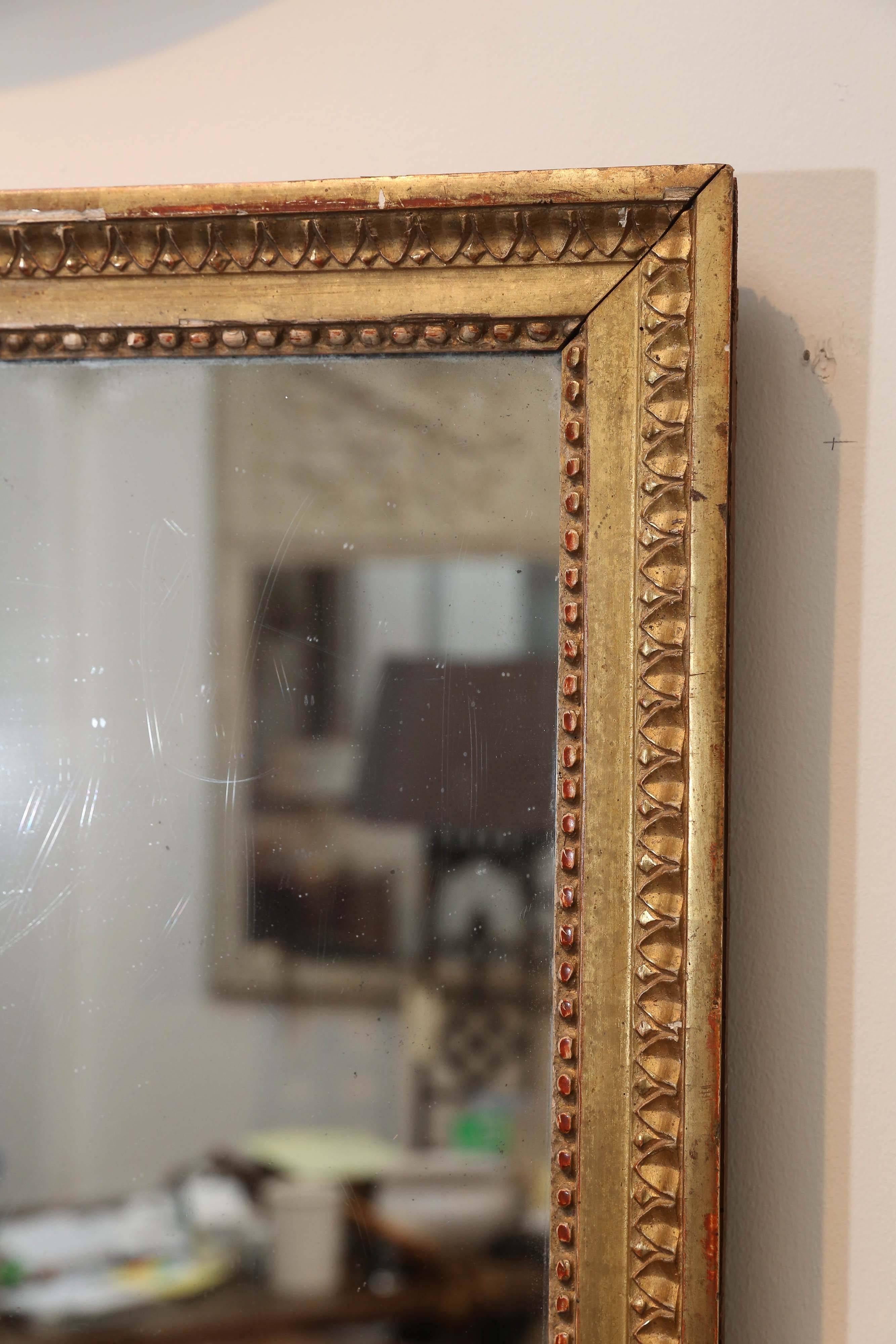 19th century gilt mirror with original glass.
