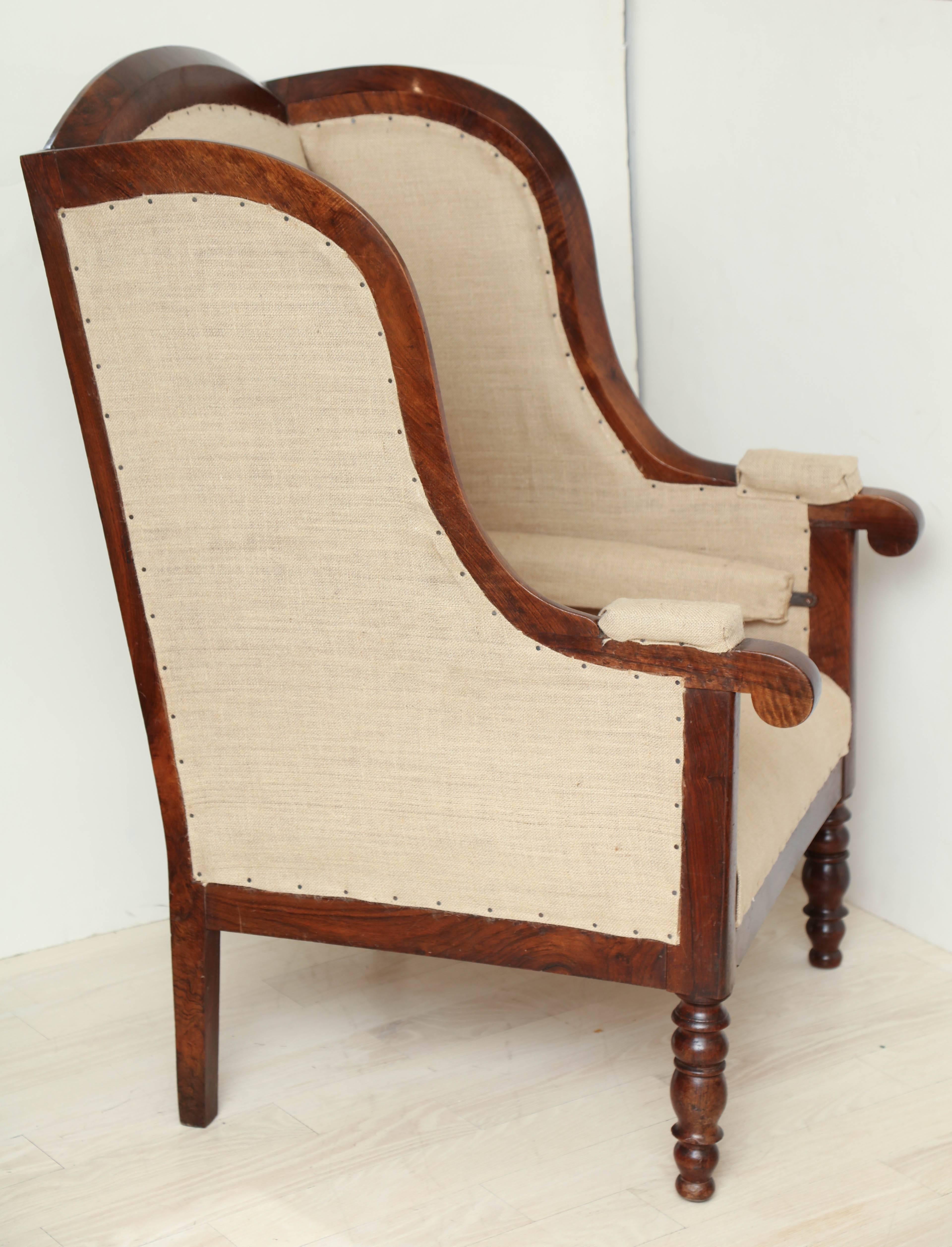 Early 19th Century French Walnut Upholstered Wing Chair For Sale 2
