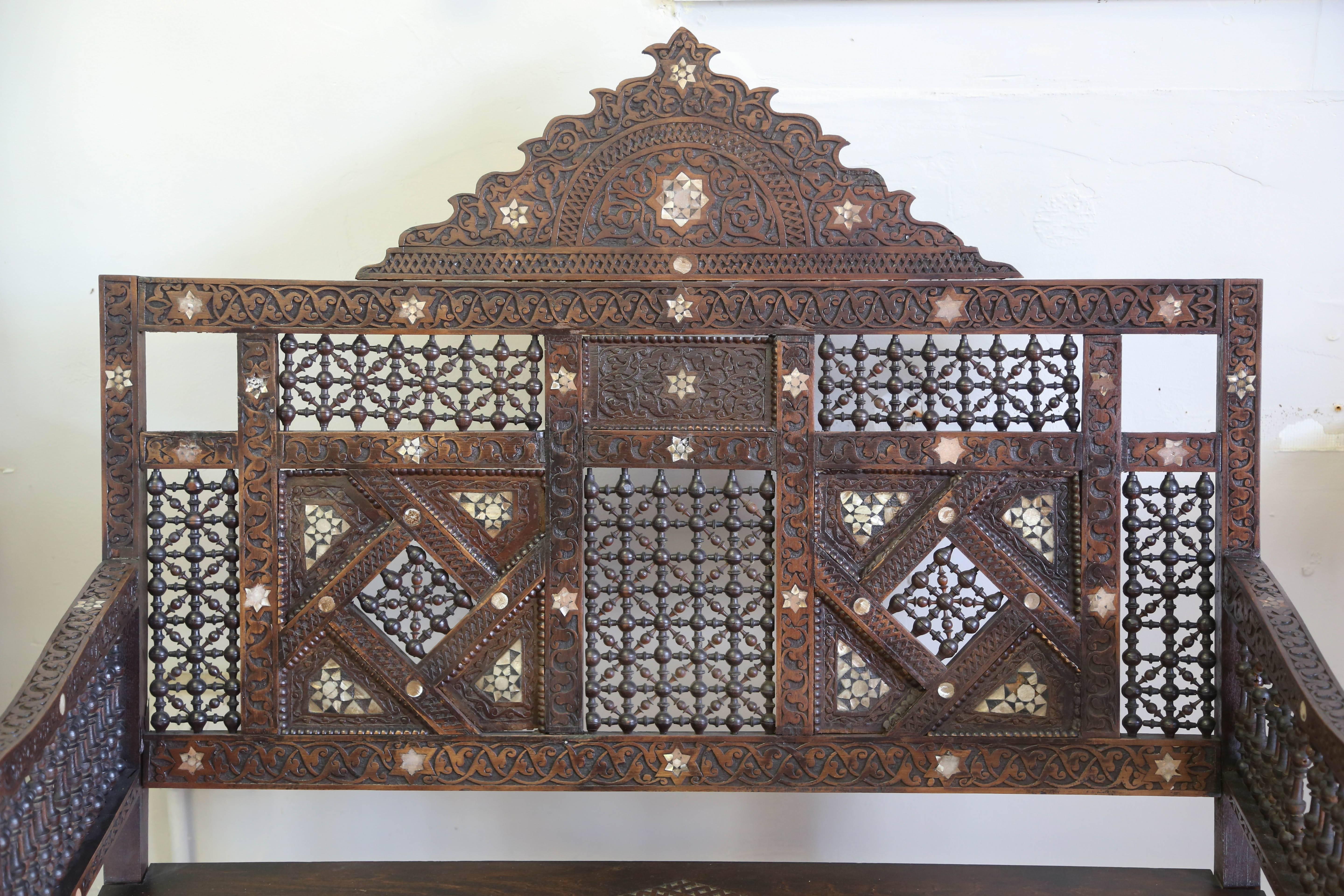 19th century Syrian carved inlaid bench with plenty of details. Great for entrance.
