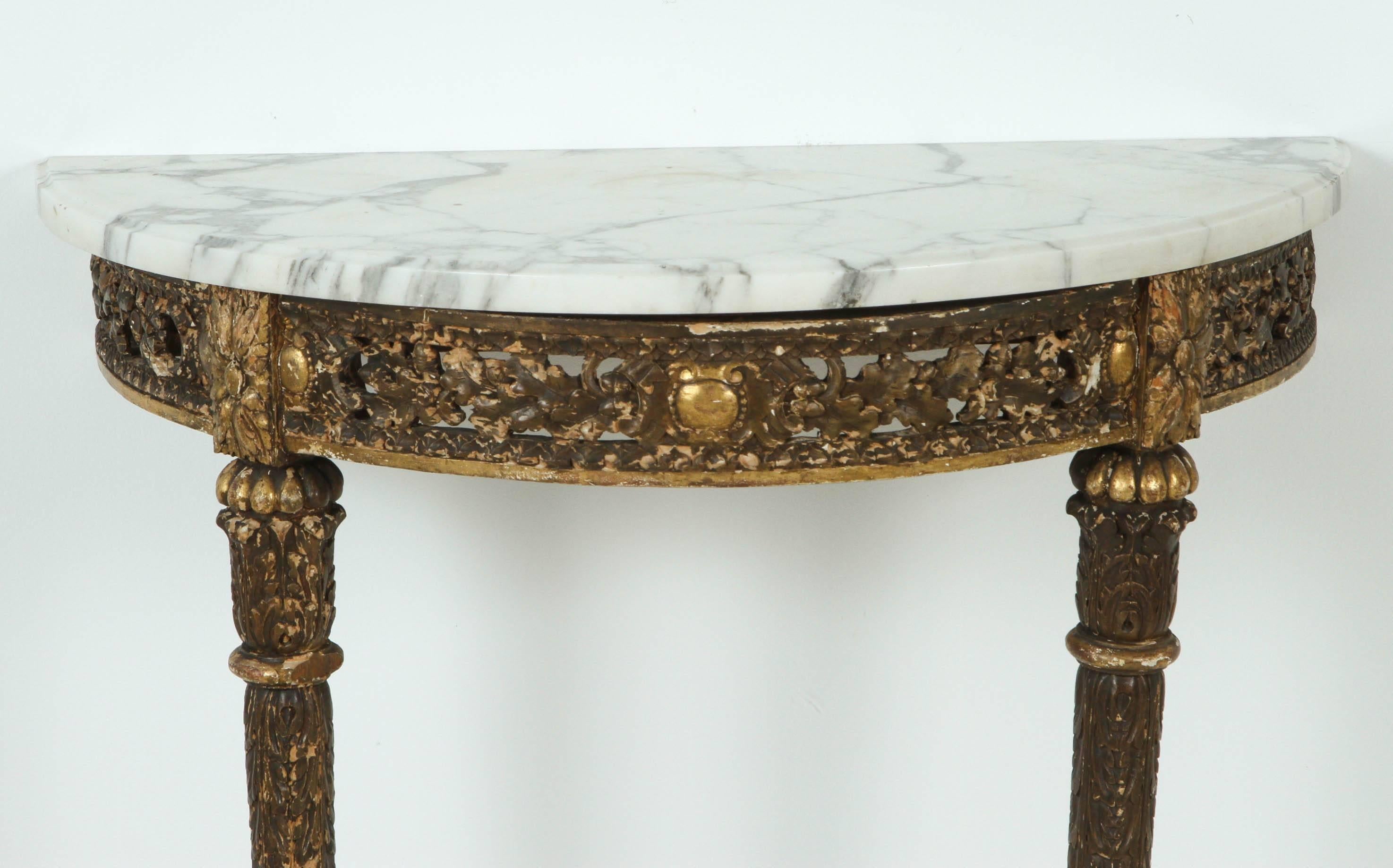 Charming petite demilune console table with white Carrara marble top.