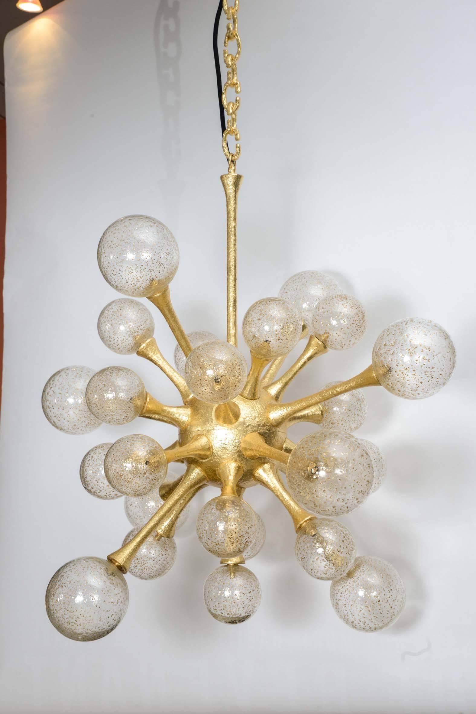 Fantastic "sputnik" chandelier with halogen lights.

High 130 cm with the channel
50 cm without.