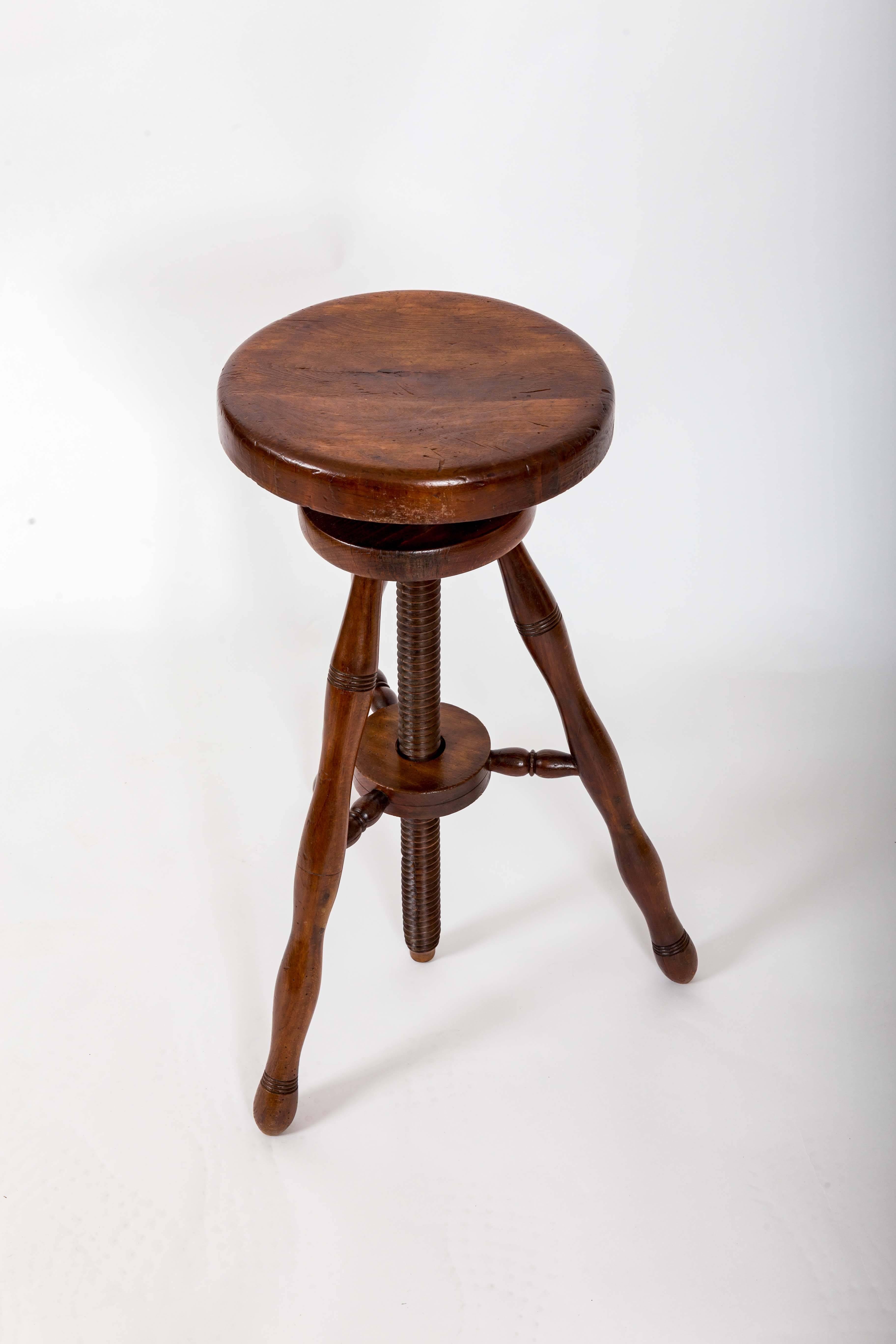 Beechwood stool with rotating swivel seat that can reach a height of 38