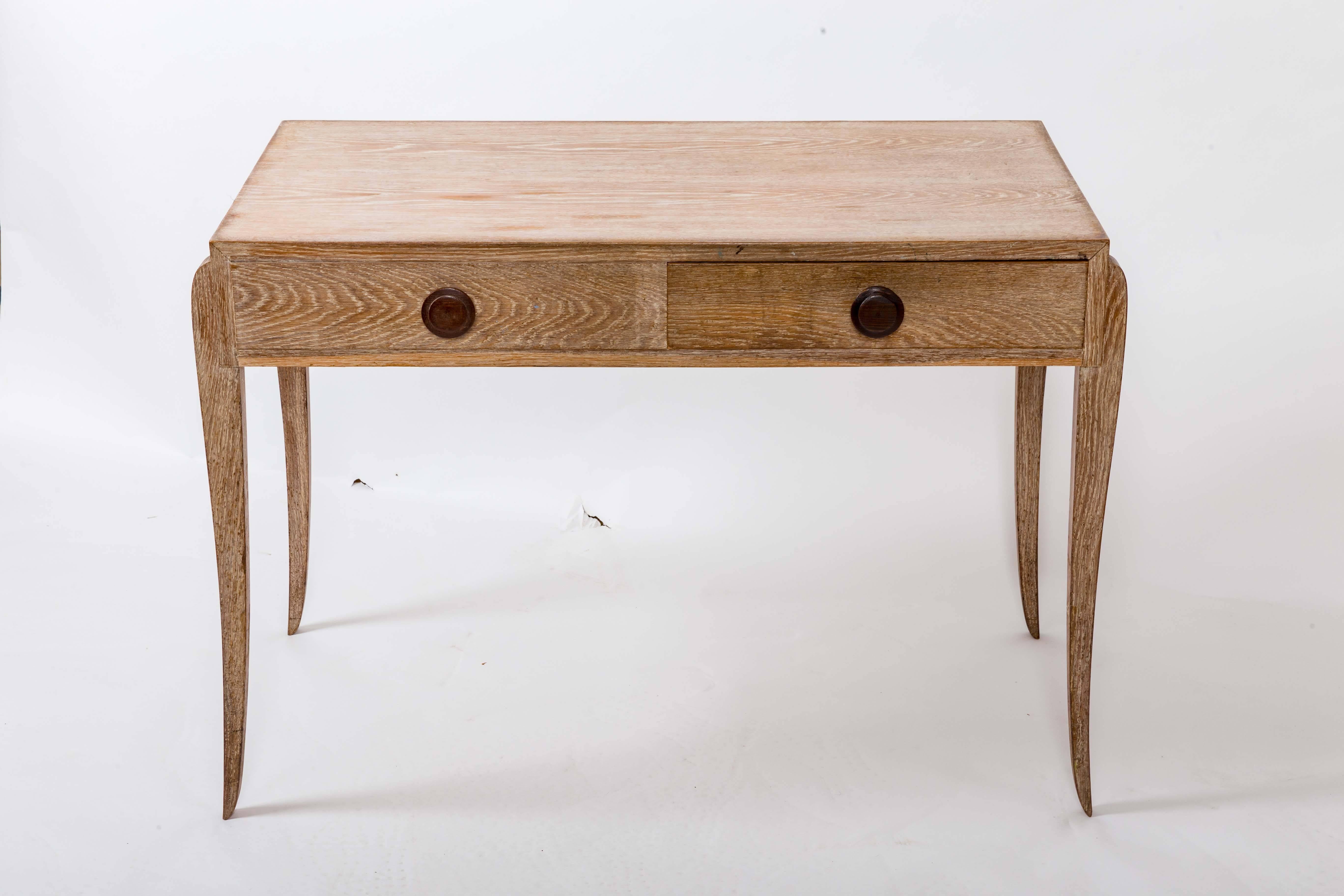 Original limed oak with shaped legs, double-sided with one working drawer and walnut painted knobs.
