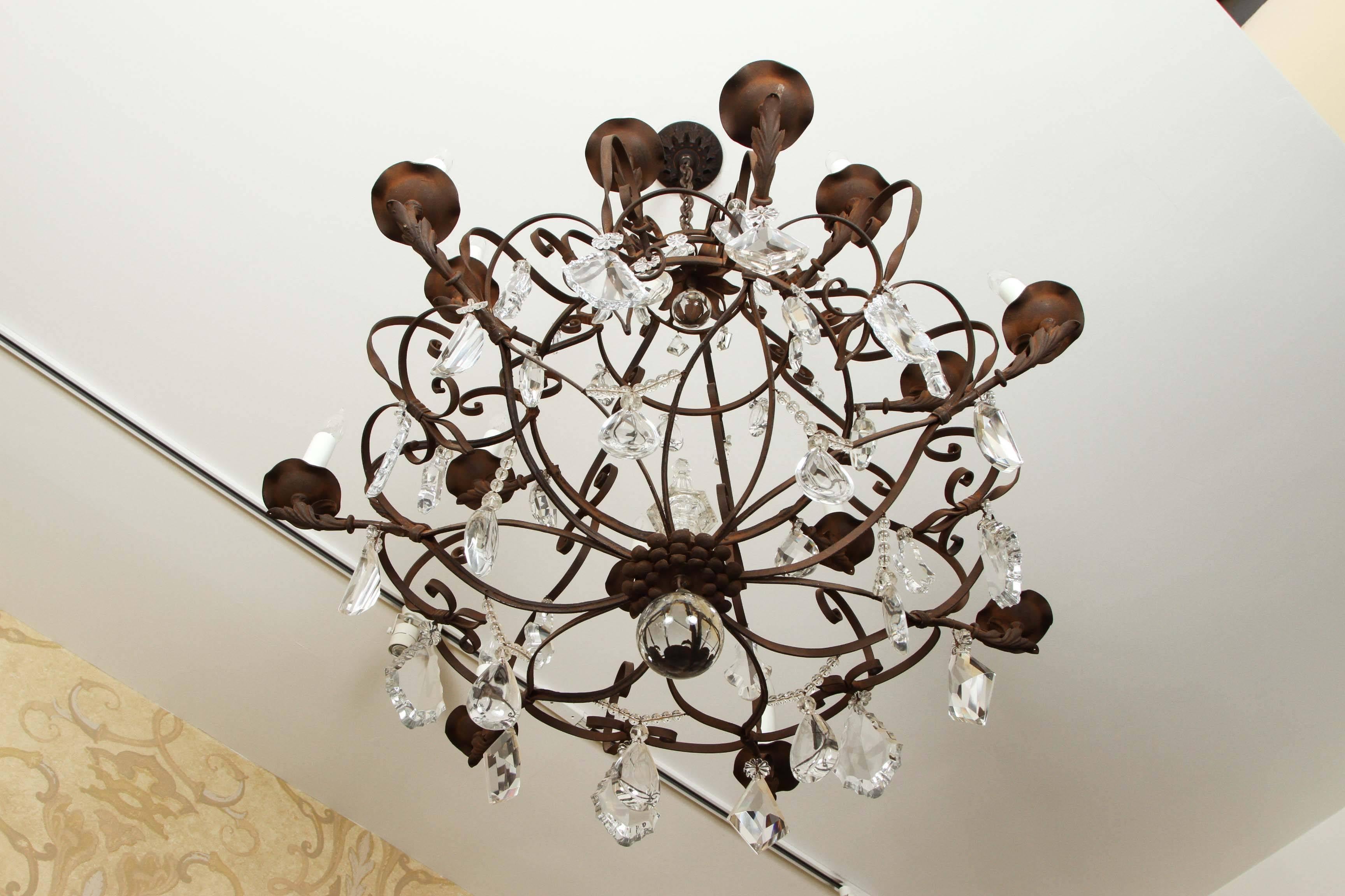 20th Century Grand Fourteen-Light Iron and Crystal Chandelier For Sale