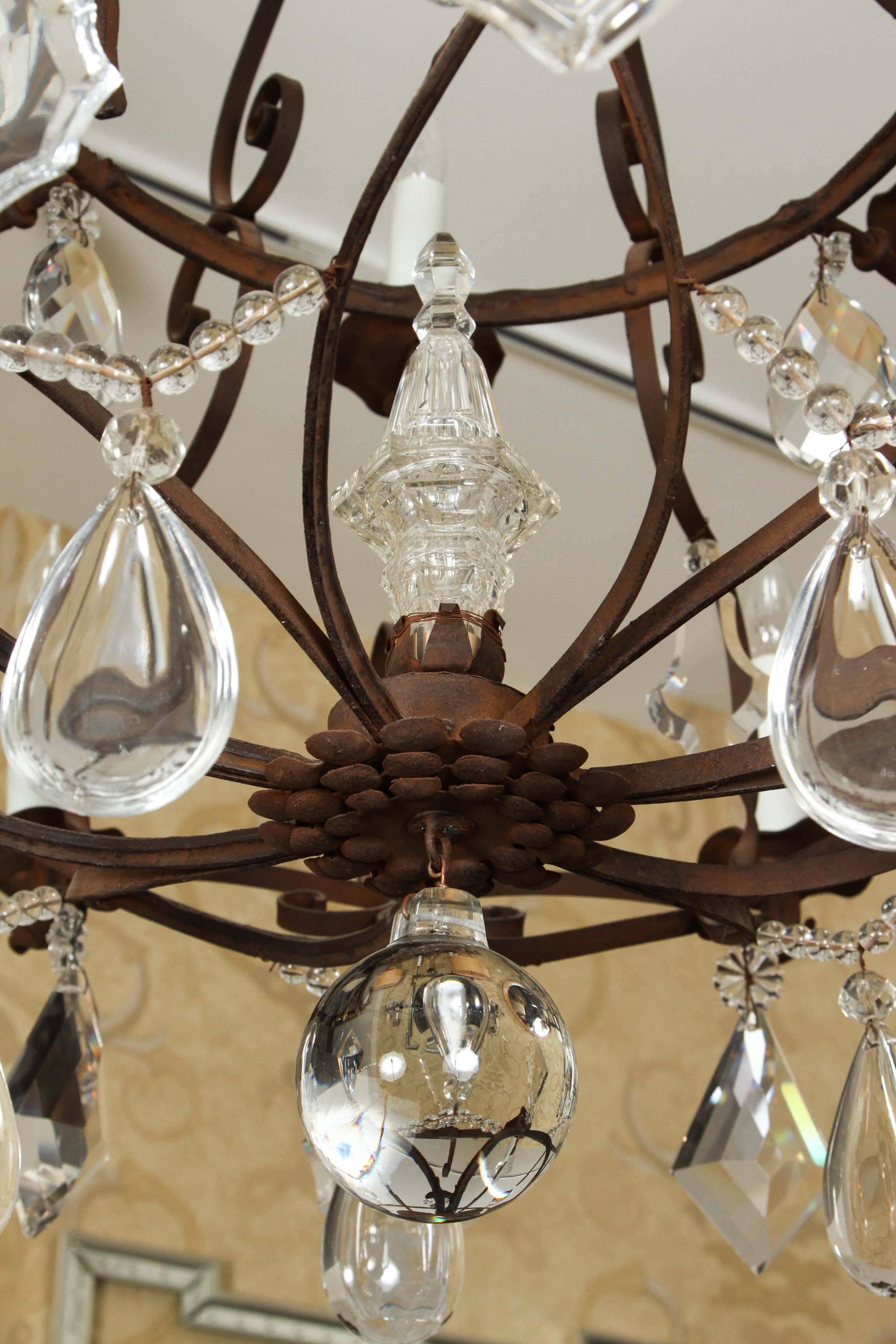 Grand Fourteen-Light Iron and Crystal Chandelier For Sale 1