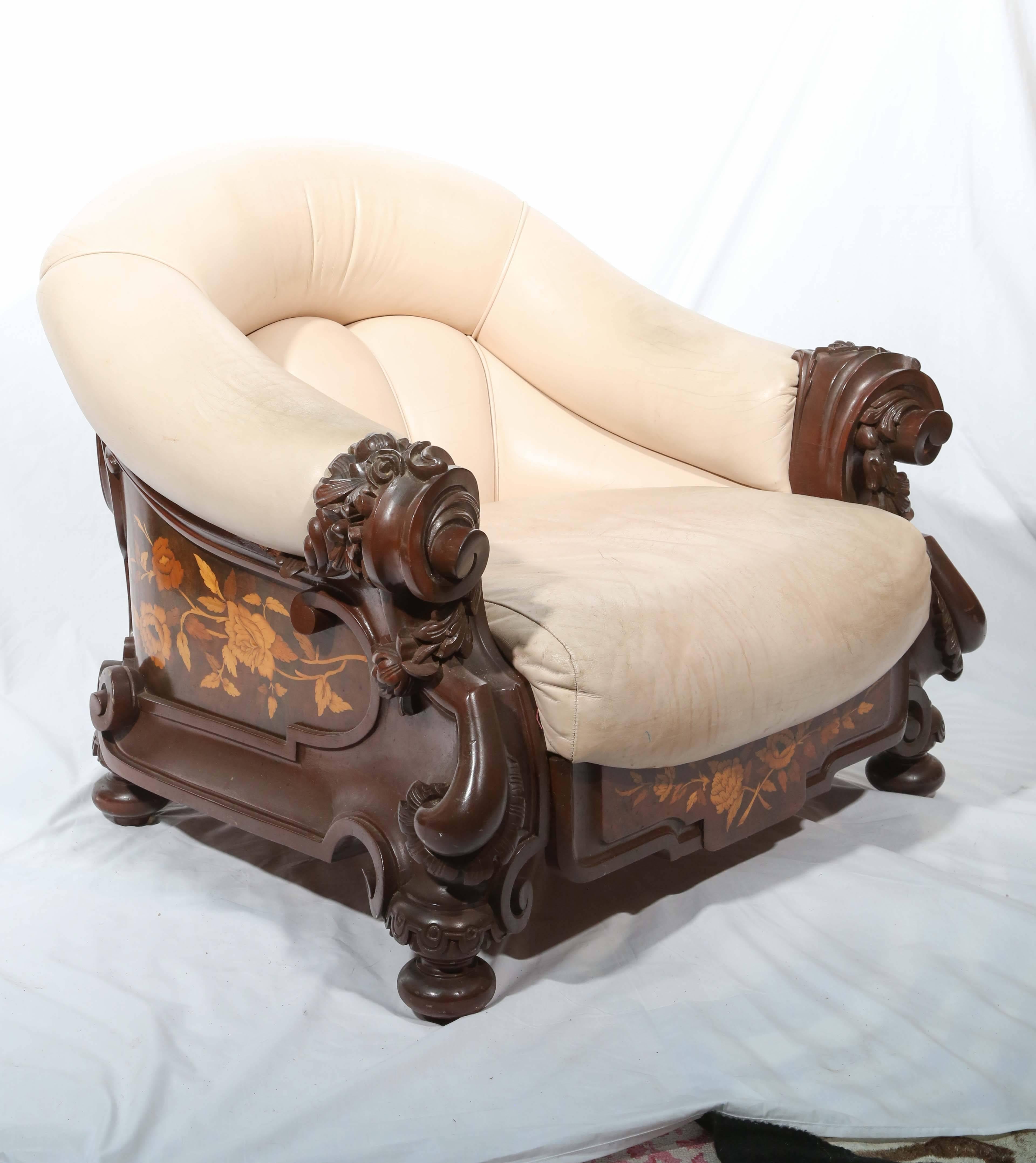 Exceptional in every detail, sumptuous leather, dramatic inlays and generous scale. Late 19th century Nouveau accent.