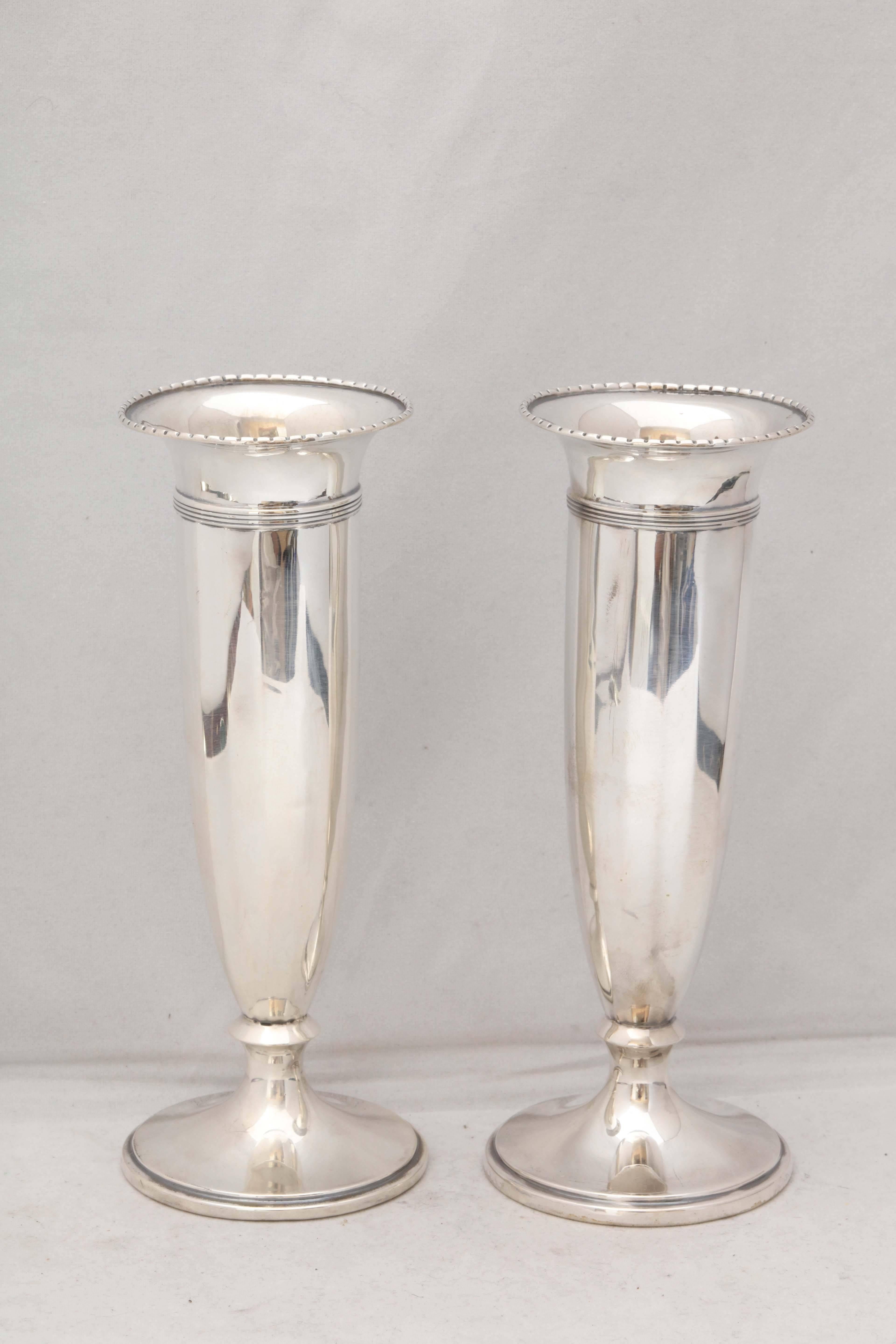 Lovely pair of Edwardian, sterling silver vases, Birmingham, England, 1923, Adie Bros. - makers. Each is 7