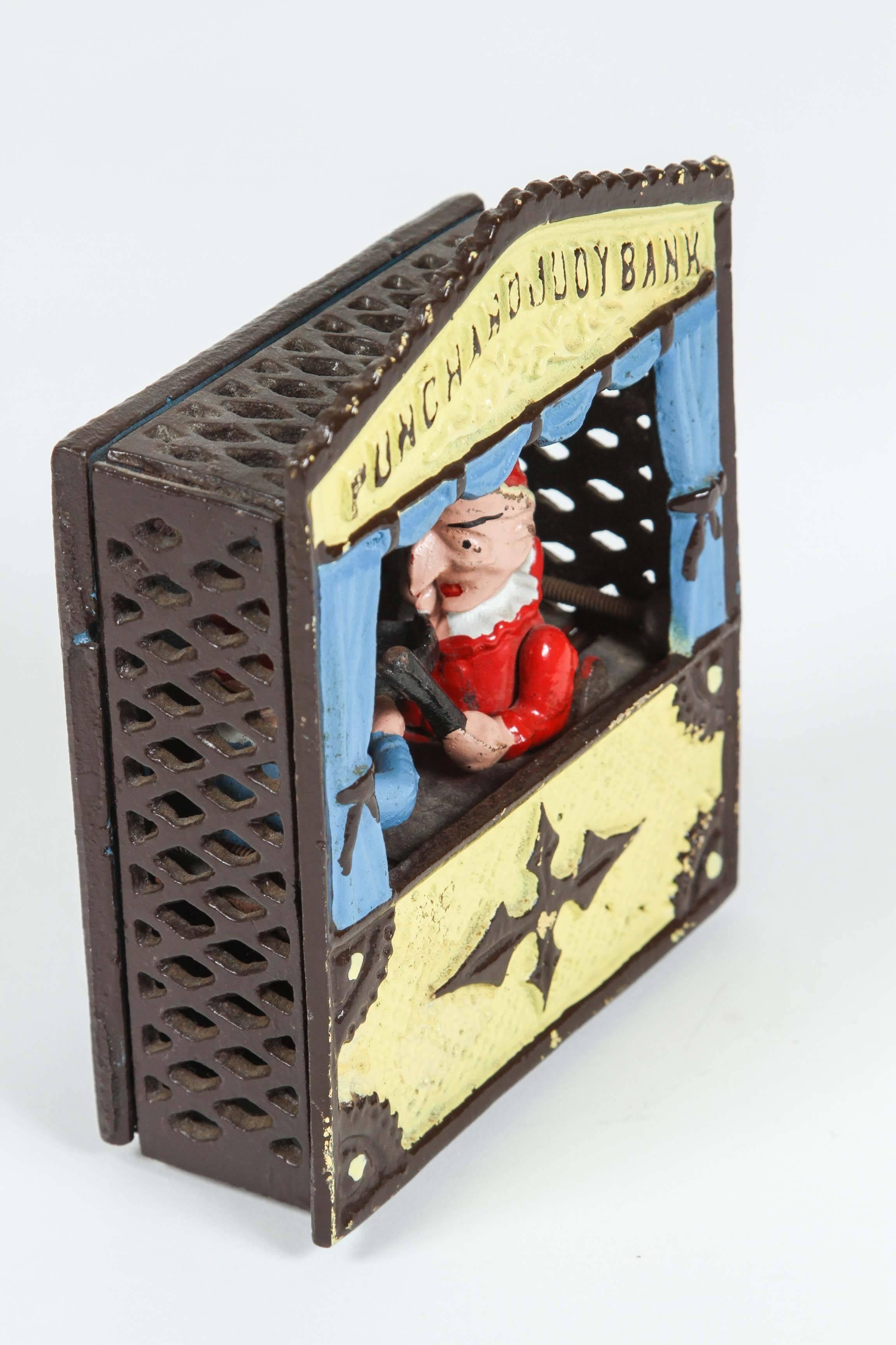 punch and judy cast iron bank