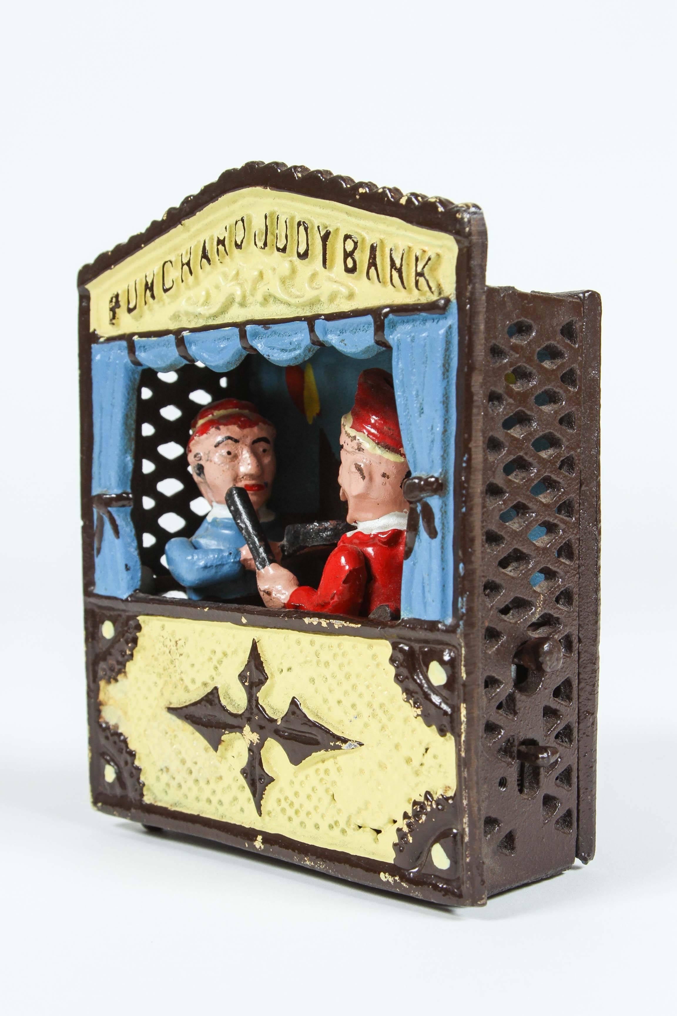 Vintage Cast Iron Book of Knowledge Mechanical Bank, Punch & Judy, 20th Century In Good Condition For Sale In North Hollywood, CA
