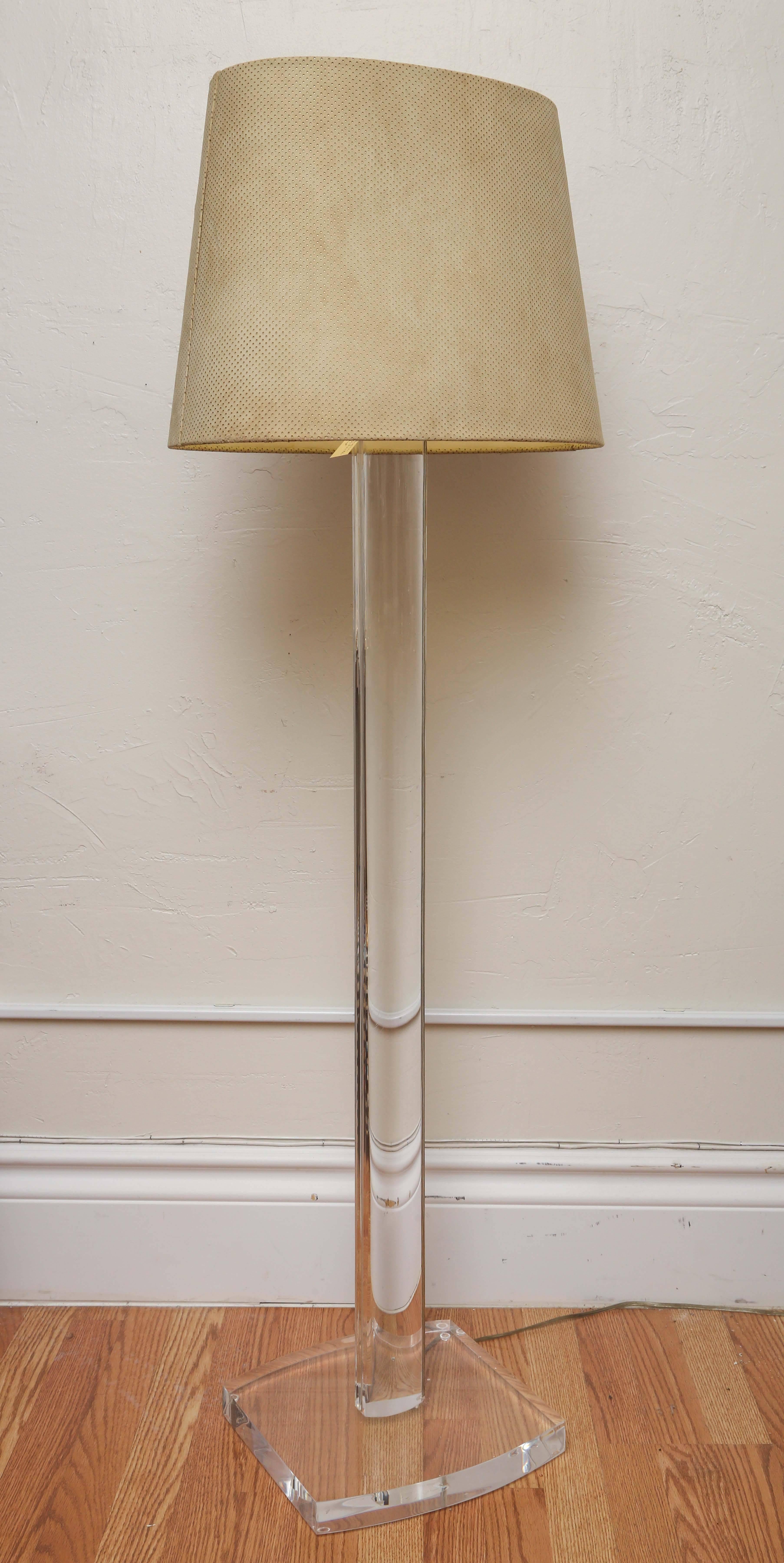 Attractive Lucite floor lamp with original pierced suede shade.