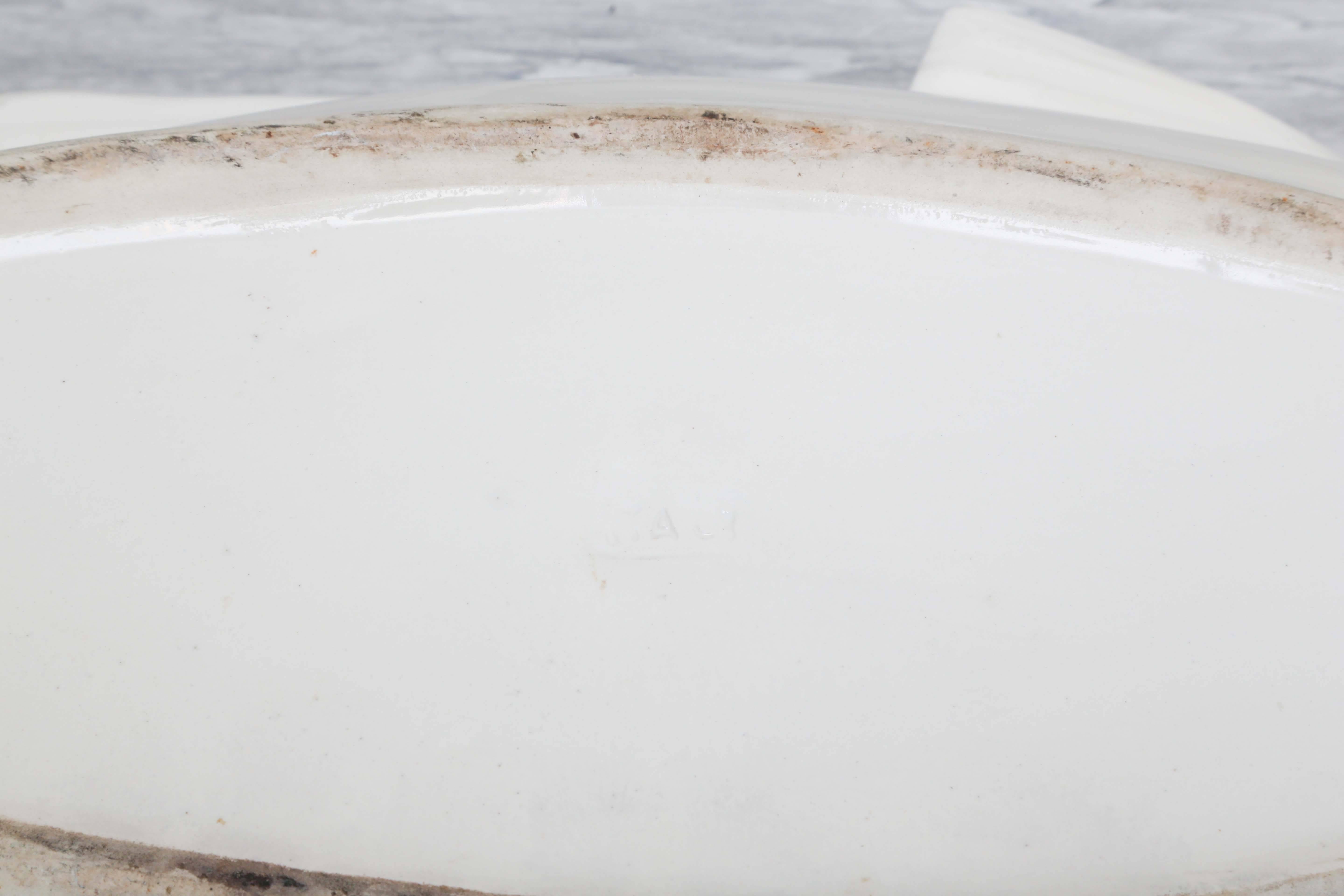 Lovely white fish tureen with lemons forming handle for lid. Incised Italy on bottom.