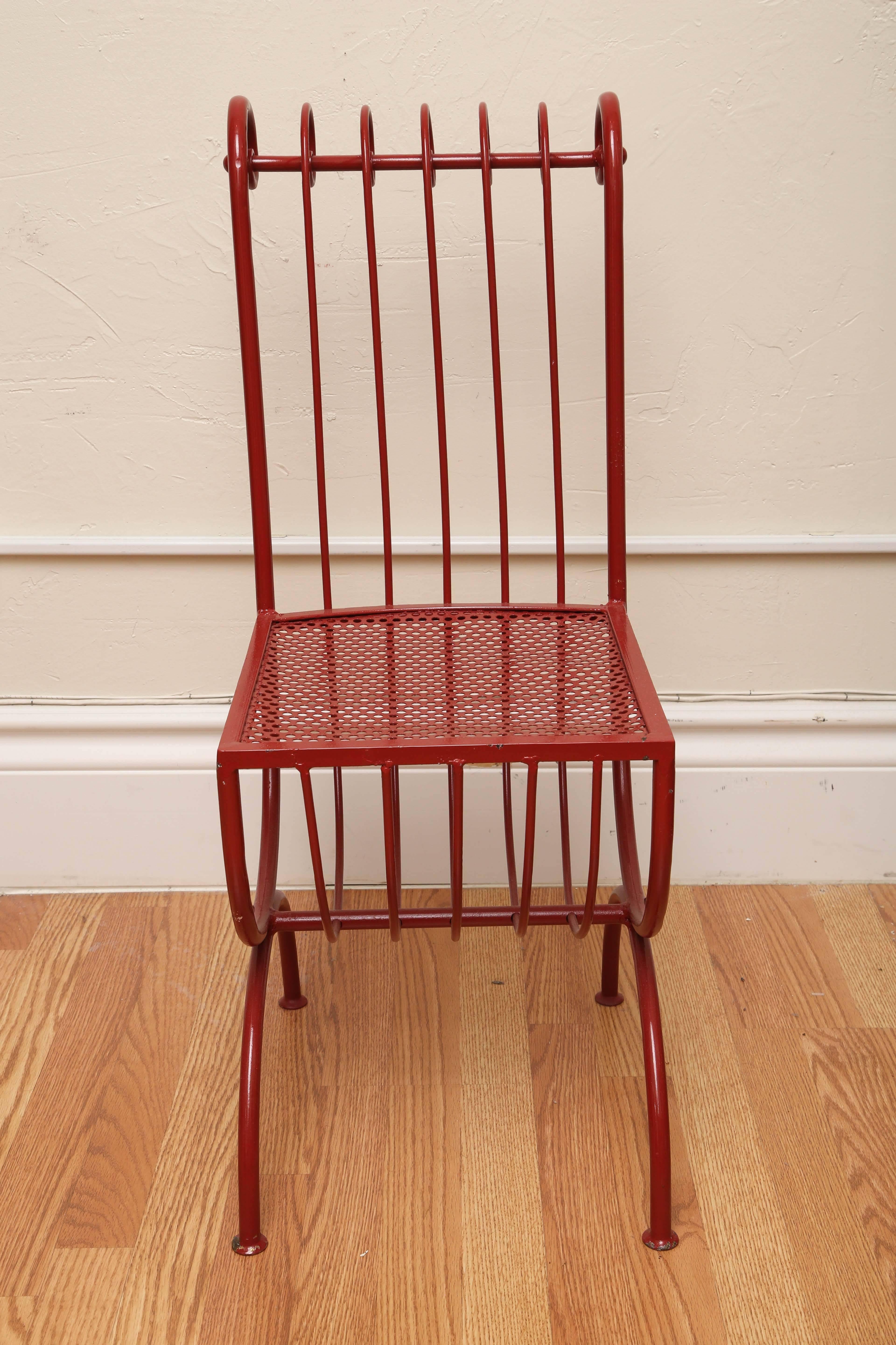 Pair of red lacquered Italian iron side chairs with mesh seat.