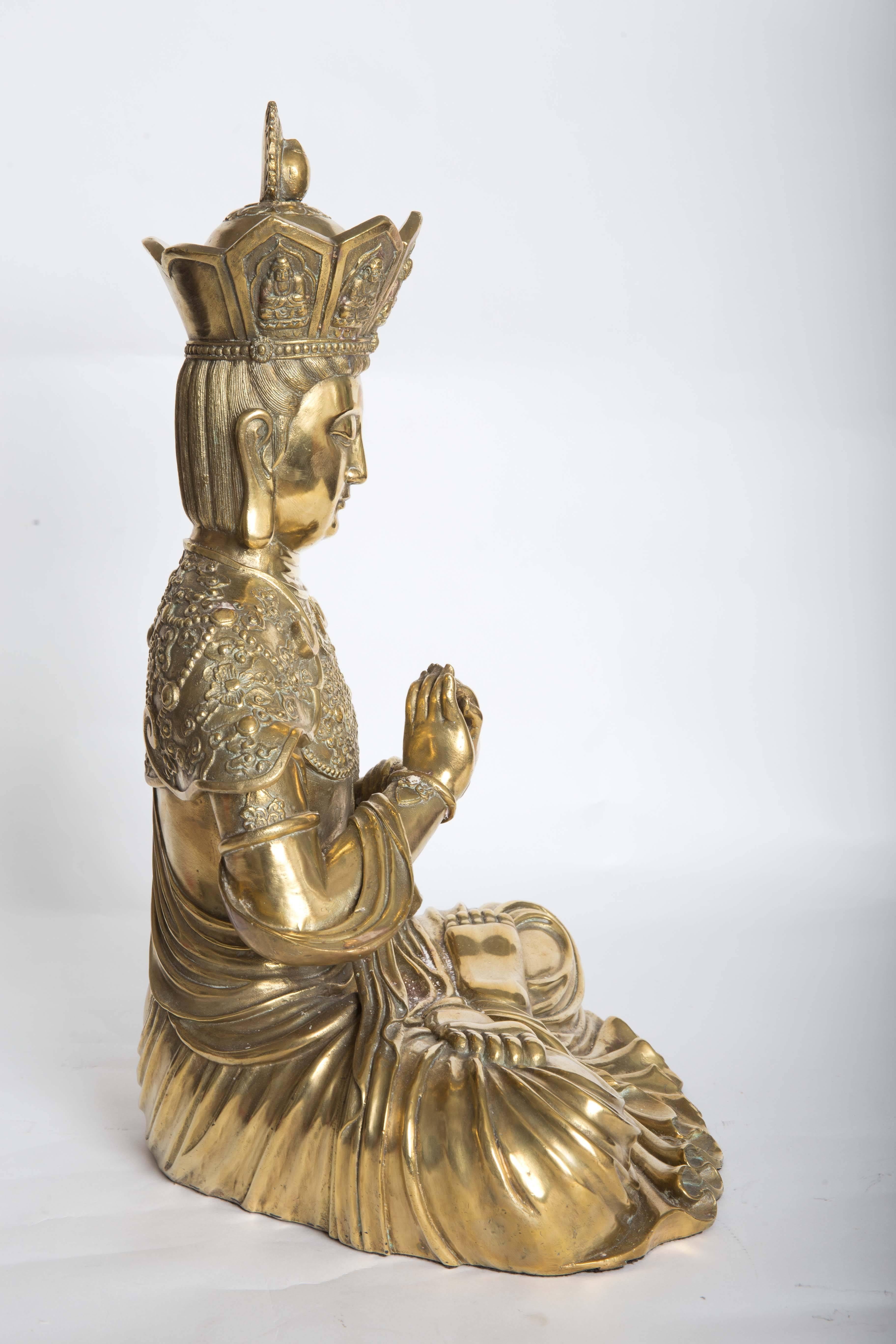 Intricately Etched Bronze Sculpture of a Seated Diety Figure 2