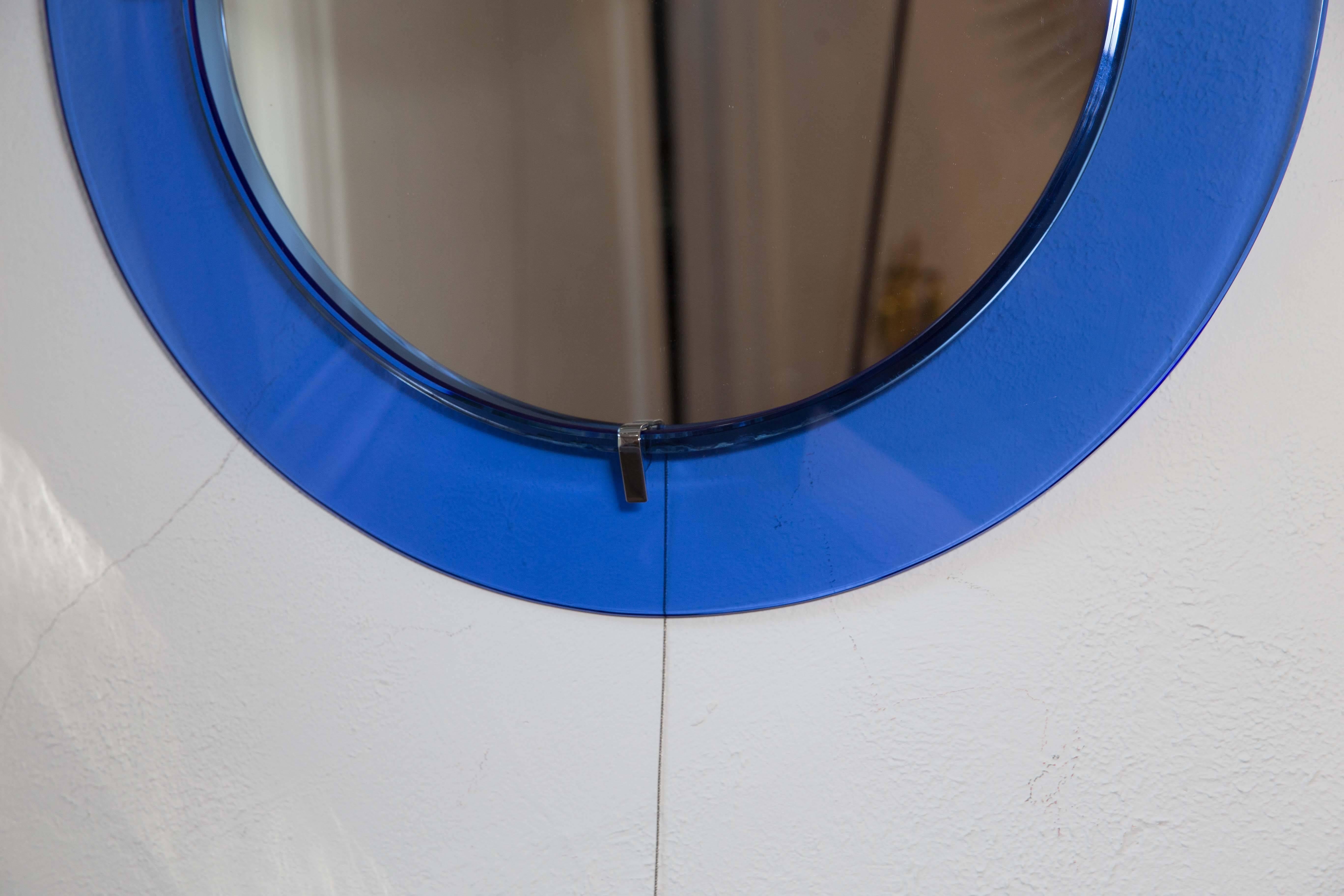 Circular Mirror with Floating Blue Glass Surround with Chrome Detail 1