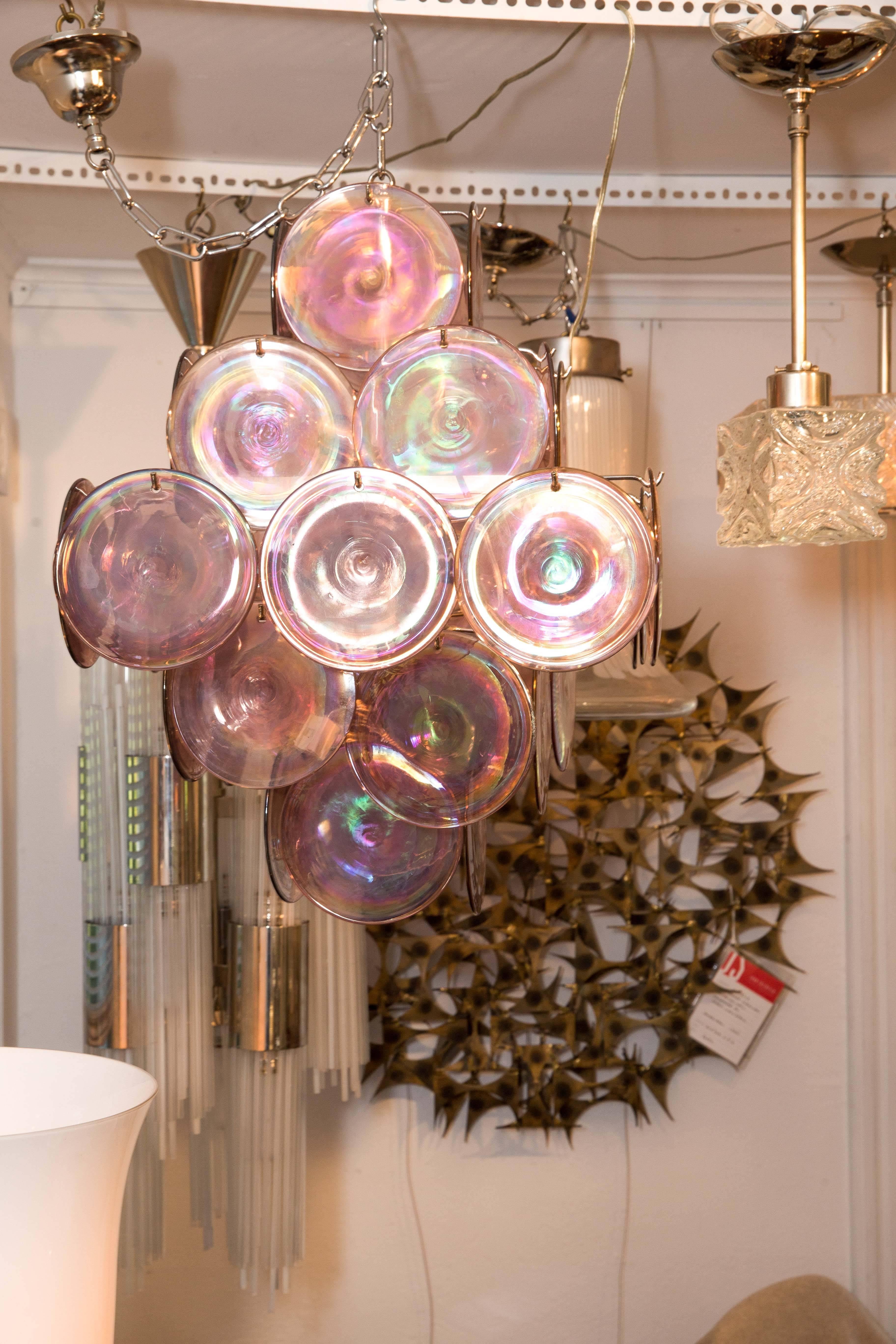Nickel chandelier composed of 36 layered purple glass disks by Vistosi
(five candelabra lights.).