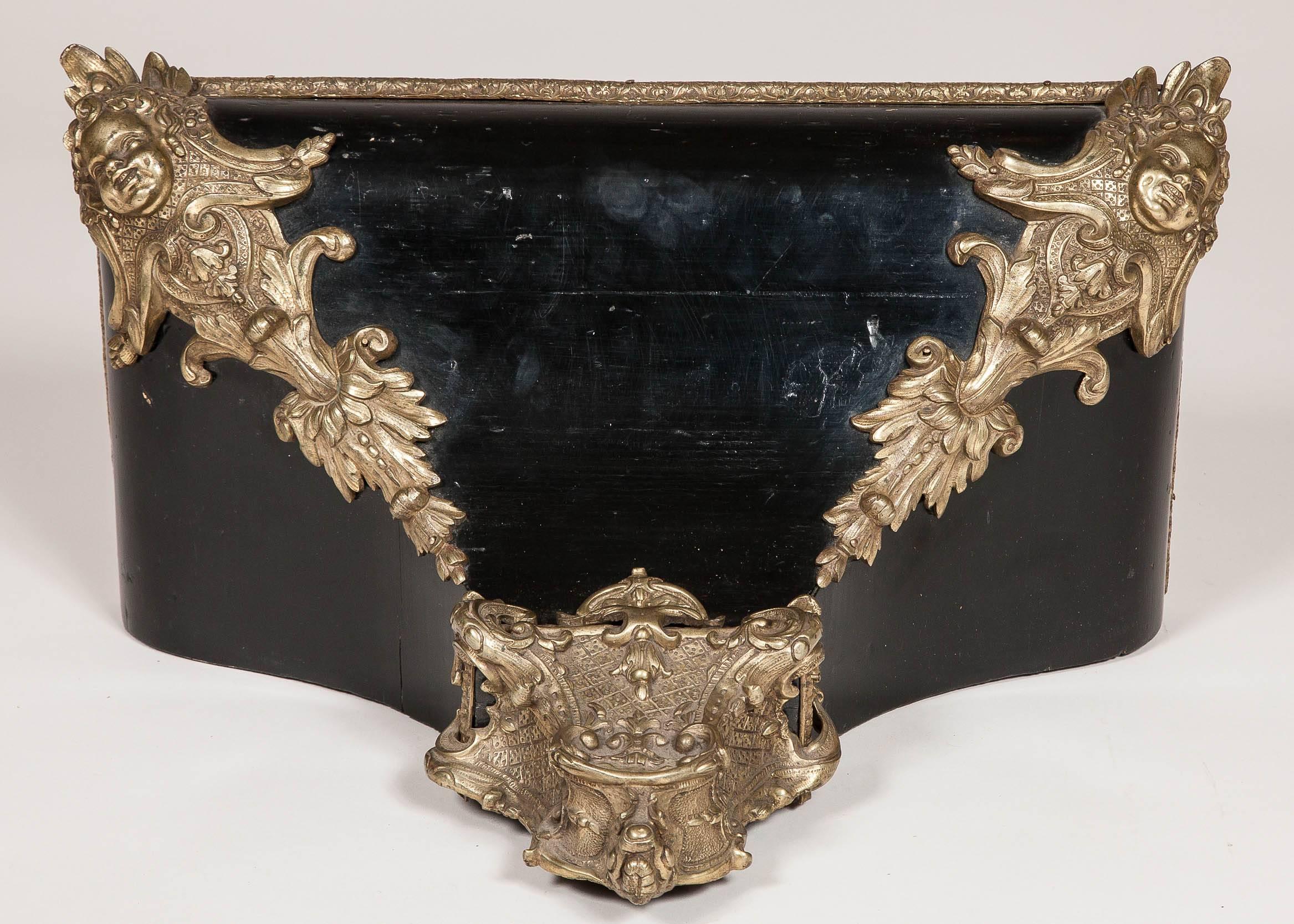 19th Century A Napoleon III ebonised French Louis XV style wall bracket with brass mounts