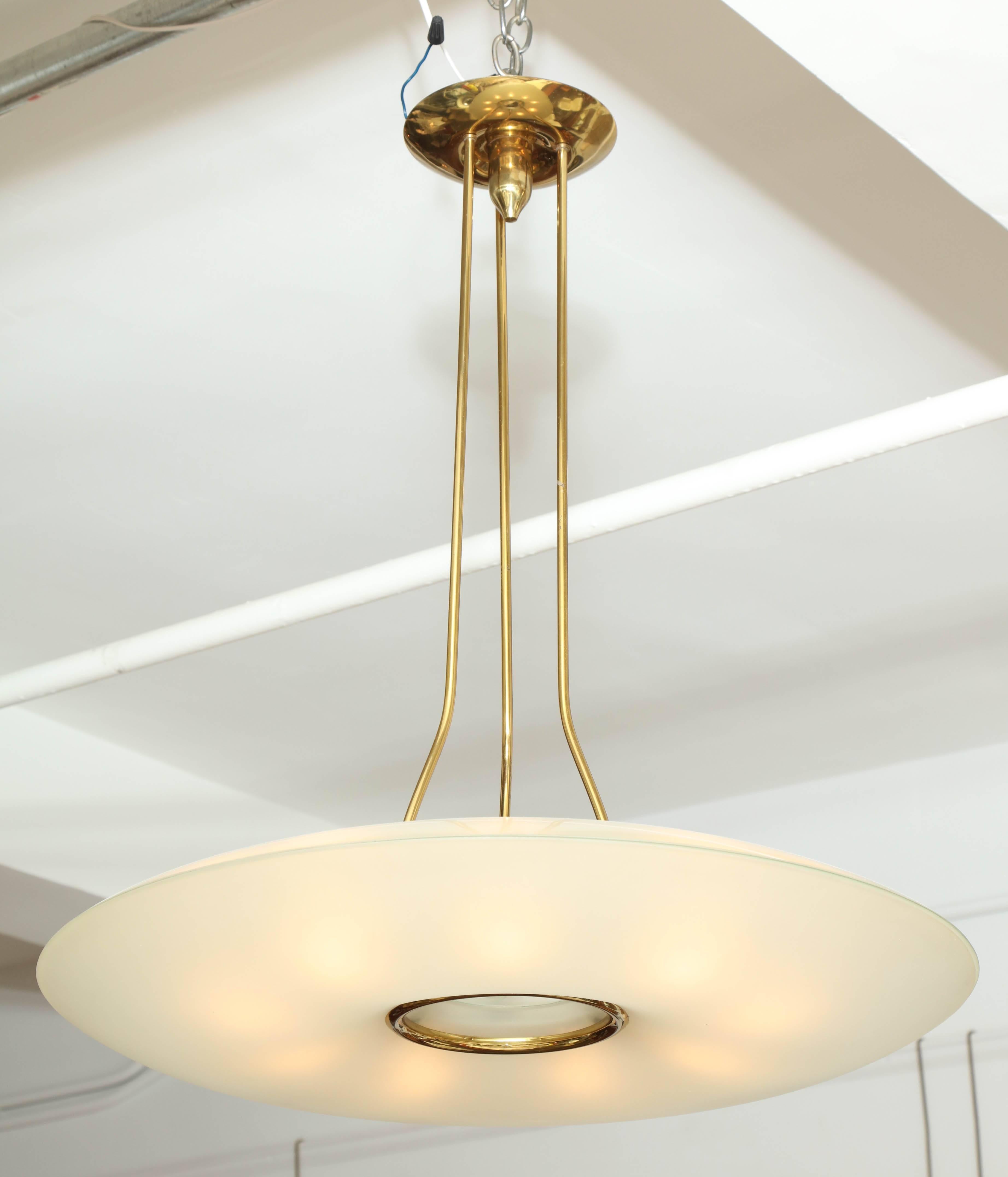Stunning round Fontana Arte nine-light chandelier made in Milan 1955 designed by Max Ingrand. Two large curved acid etched glass shades mounted onto a hand made brass frame. This chandelier is unusual in the sense that it still has it's top half