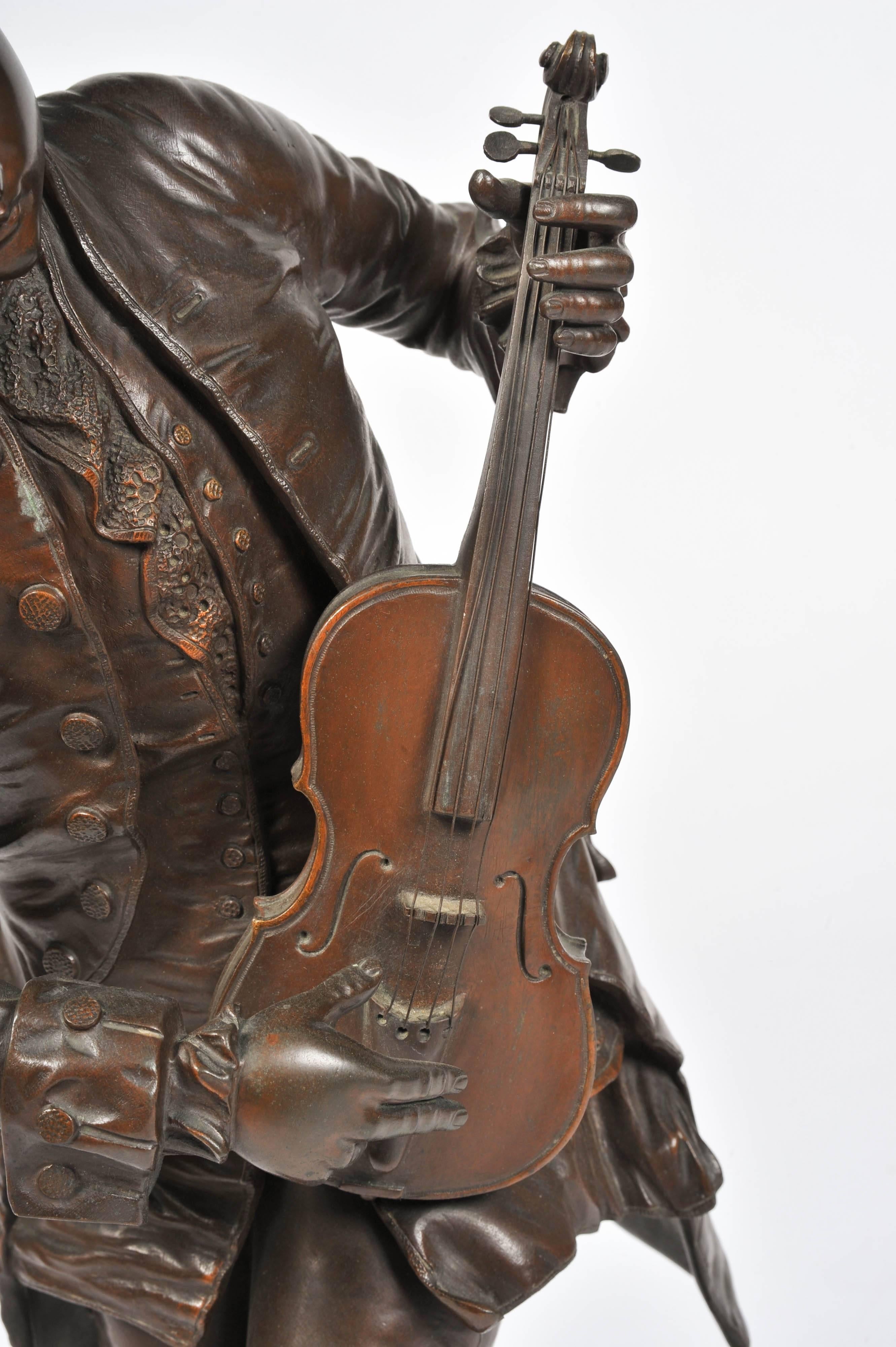 A very good quality 19th century bronze statue of Mozart playing a Violin.